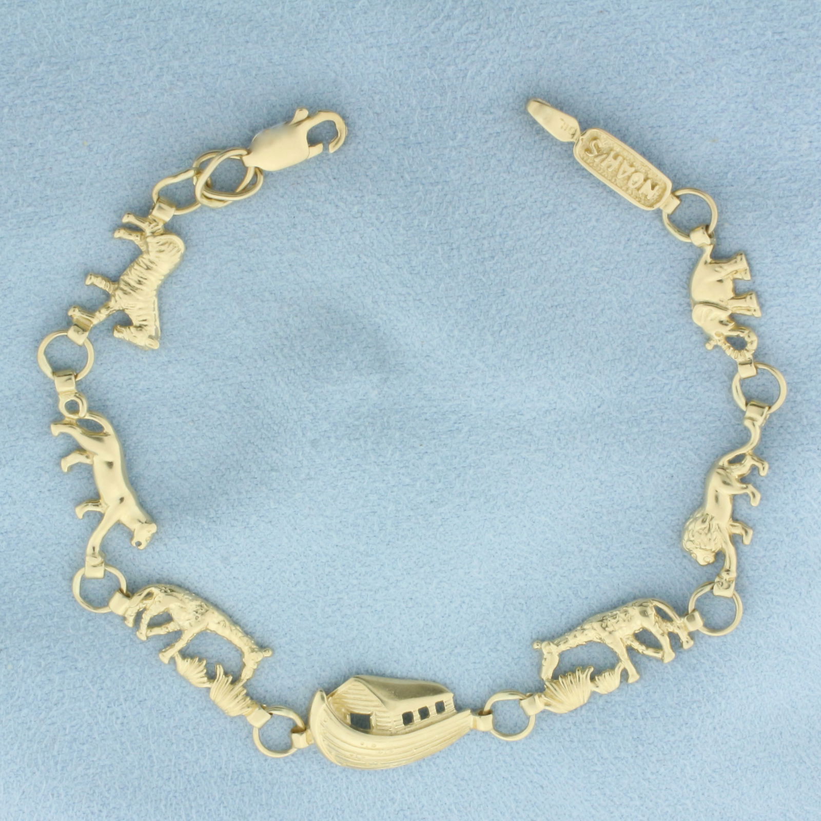 Noah's Ark Animal Bracelet in 14k Yellow Gold: In 14k Yellow Gold. 7 5/8 inches long. 9.5mm wide (at widest). 6.9g.