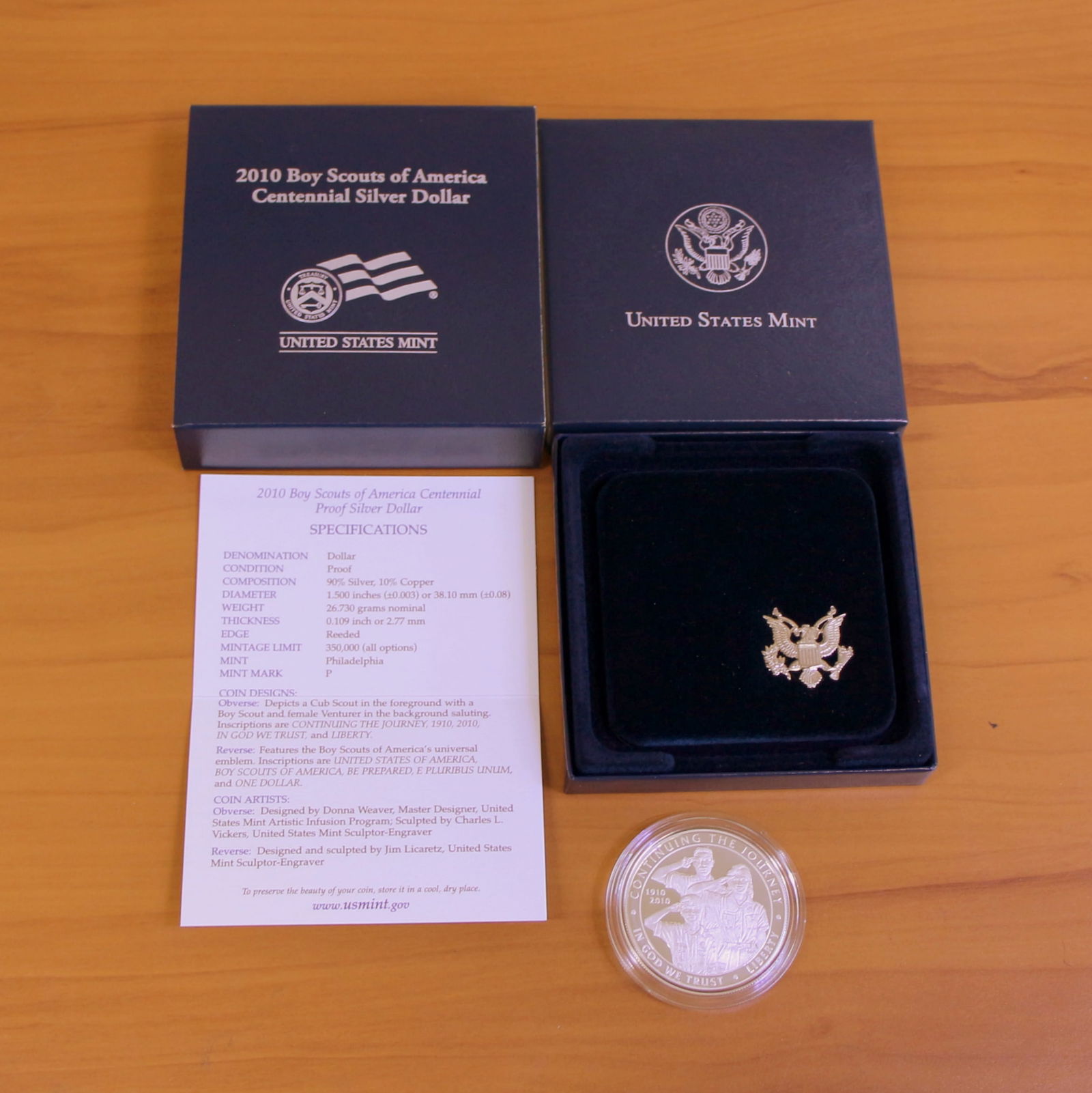 US Mint Boy Scouts of America Centennial Silver Dollar Coin OGP: Contains one 2010 90% Silver Boy Scouts of America Centennial Silver Dollar. Set in original government packaging and contains certificate of authenticity.