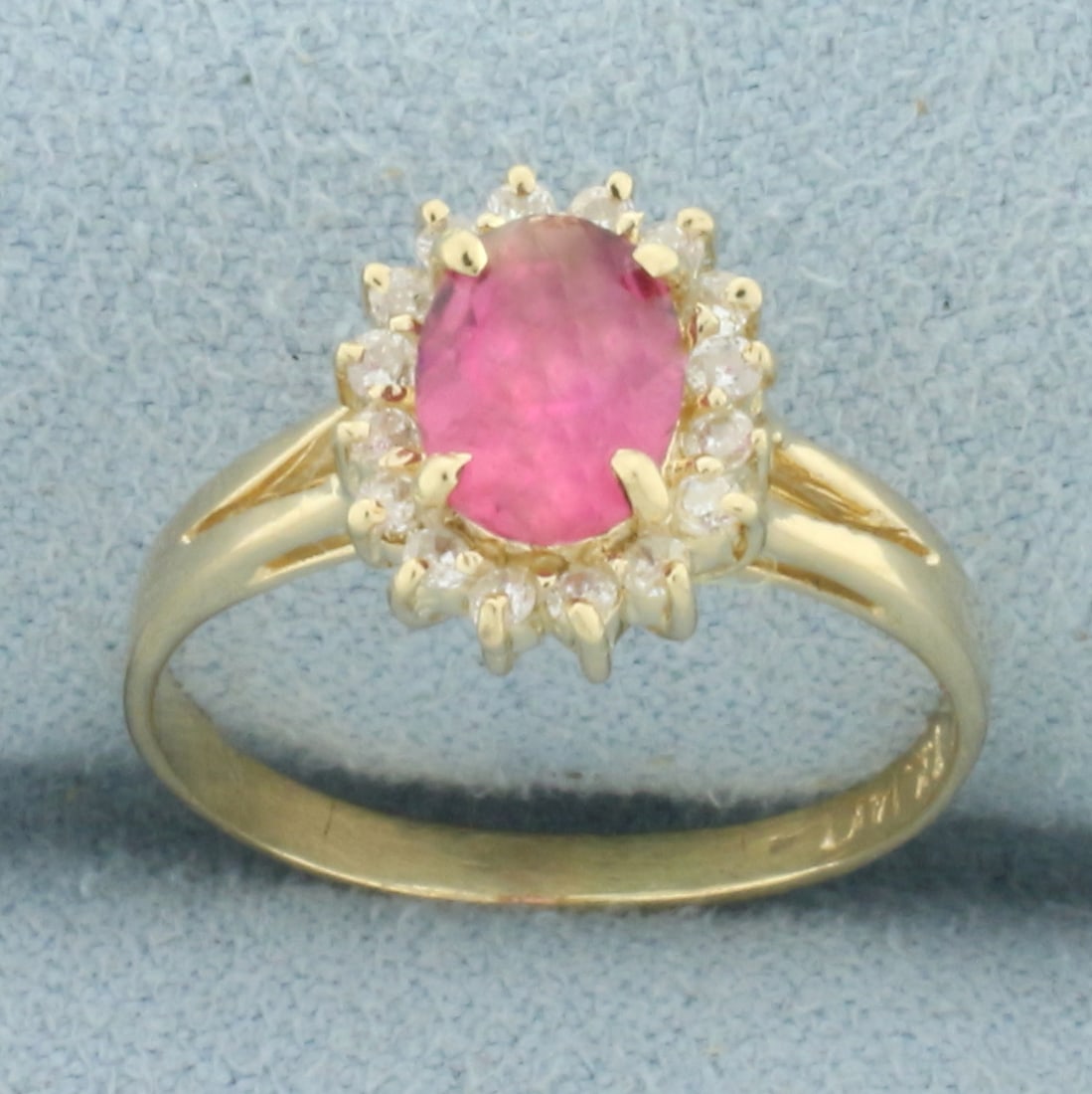 Morganite and Diamond Halo Princess Diana Ring in 14k Yellow Gold: In 14k yellow gold. Contains one high quality natural 1ct Morganite gemstone with intense pink salmon color and excellent clarity. Also contains sixteen high quality .01ct diamonds, SI clarity/H