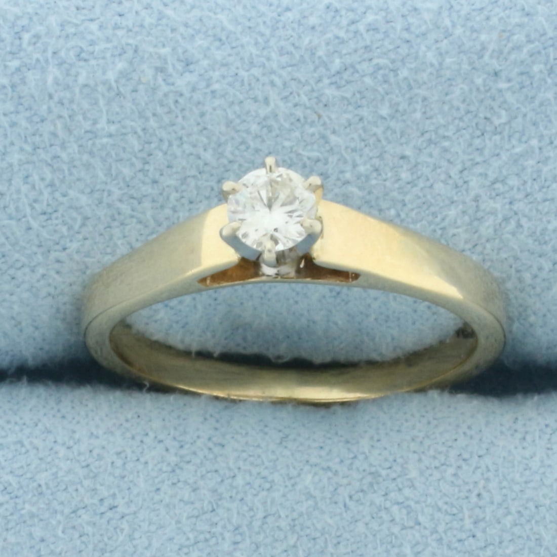 Cathedral Set Diamond Solitaire Engagement Ring in 14k Yellow Gold: In 14k Yellow Gold. Contains one high quality 1/4 ct diamond, VS clarity/H color. Size 7.5. 3.1g.