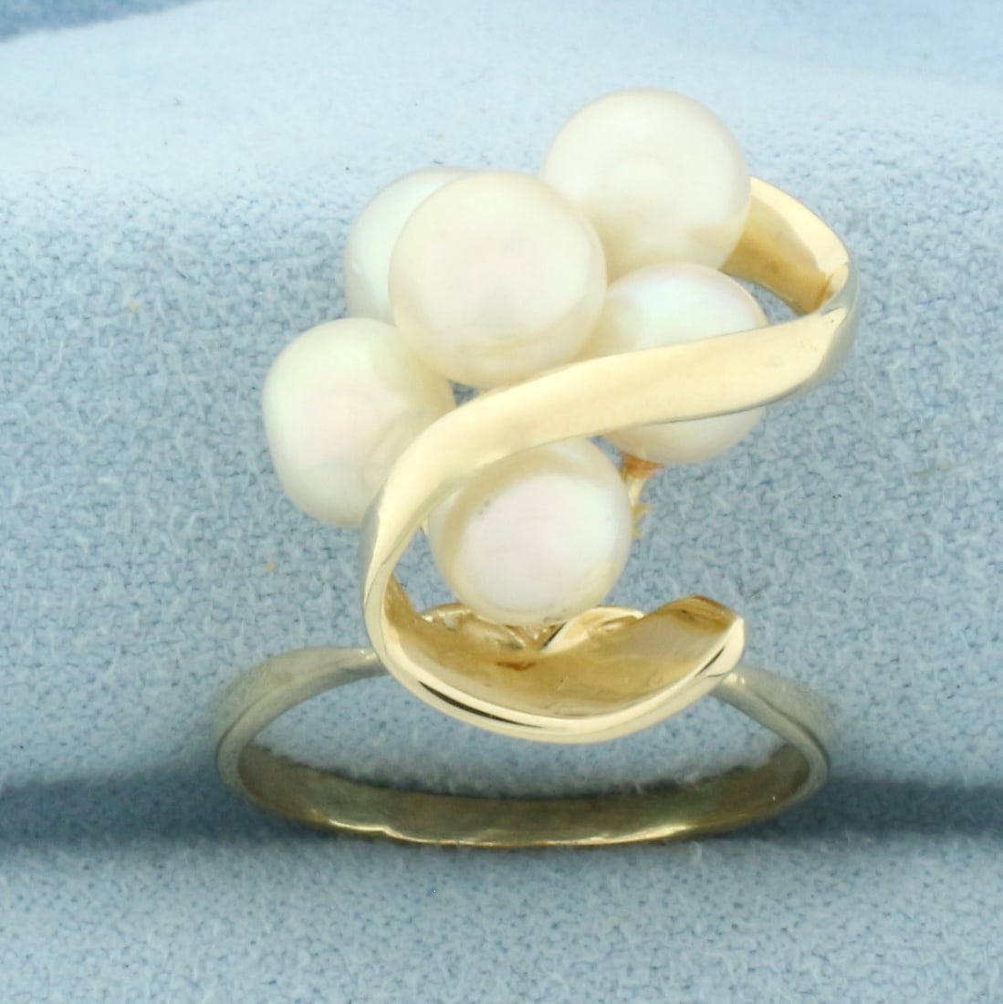 Designer Akoya Pearl Cocktail Ring in 14k Yellow Gold: In 14k Yellow Gold. Contains six high quality 6.2mm cultured akoya pearls with high luster. 21mm wide at top. Size 7. 4.8g.