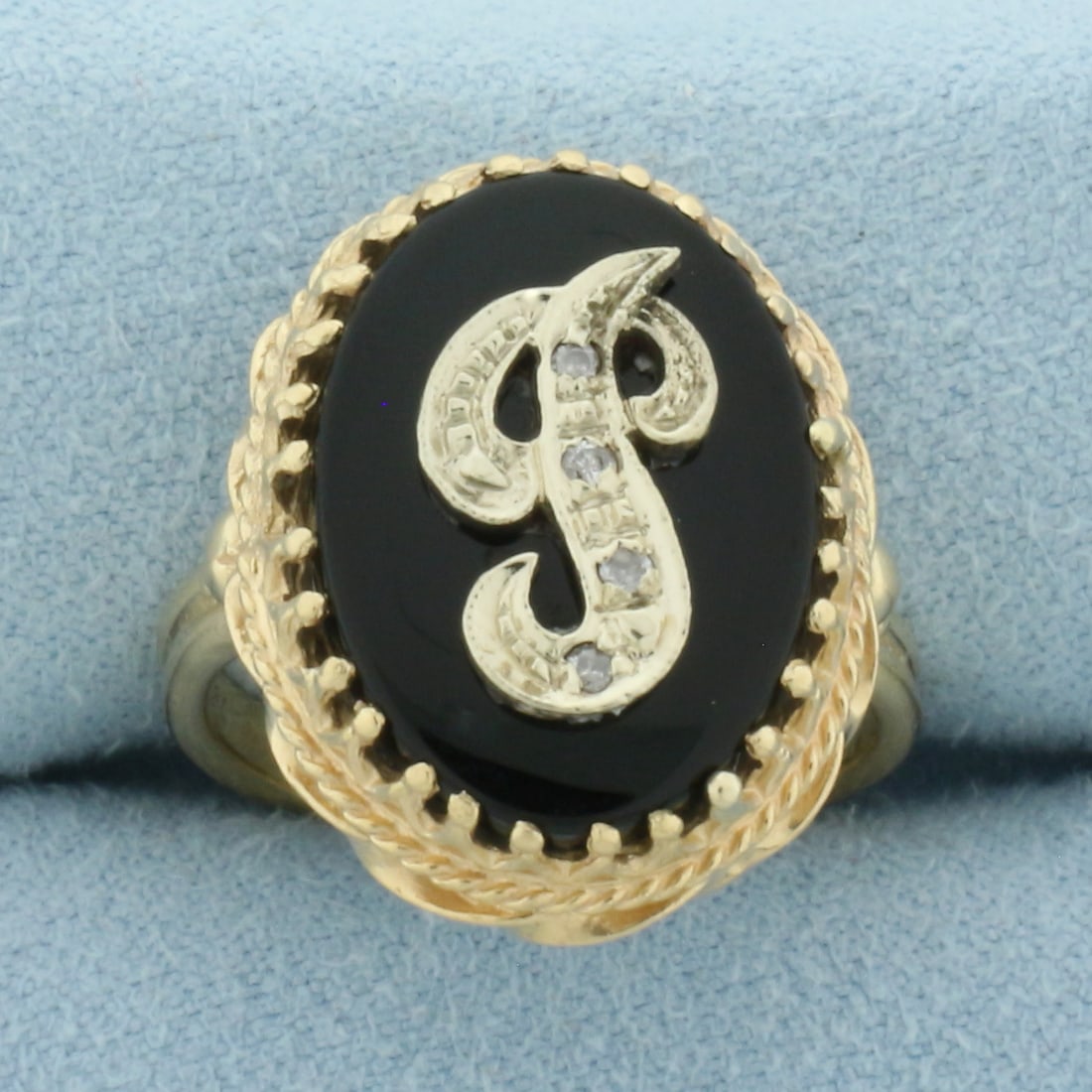 Diamond and Onyx "J" Initial Signet Ring in 14k Yellow Gold: In 14k Yellow Gold. 18x13mm oval onyx plaque. Also contains four high quality .01ct diamonds. 21mm wide at top of ring. Size 7.5. 7.9g.