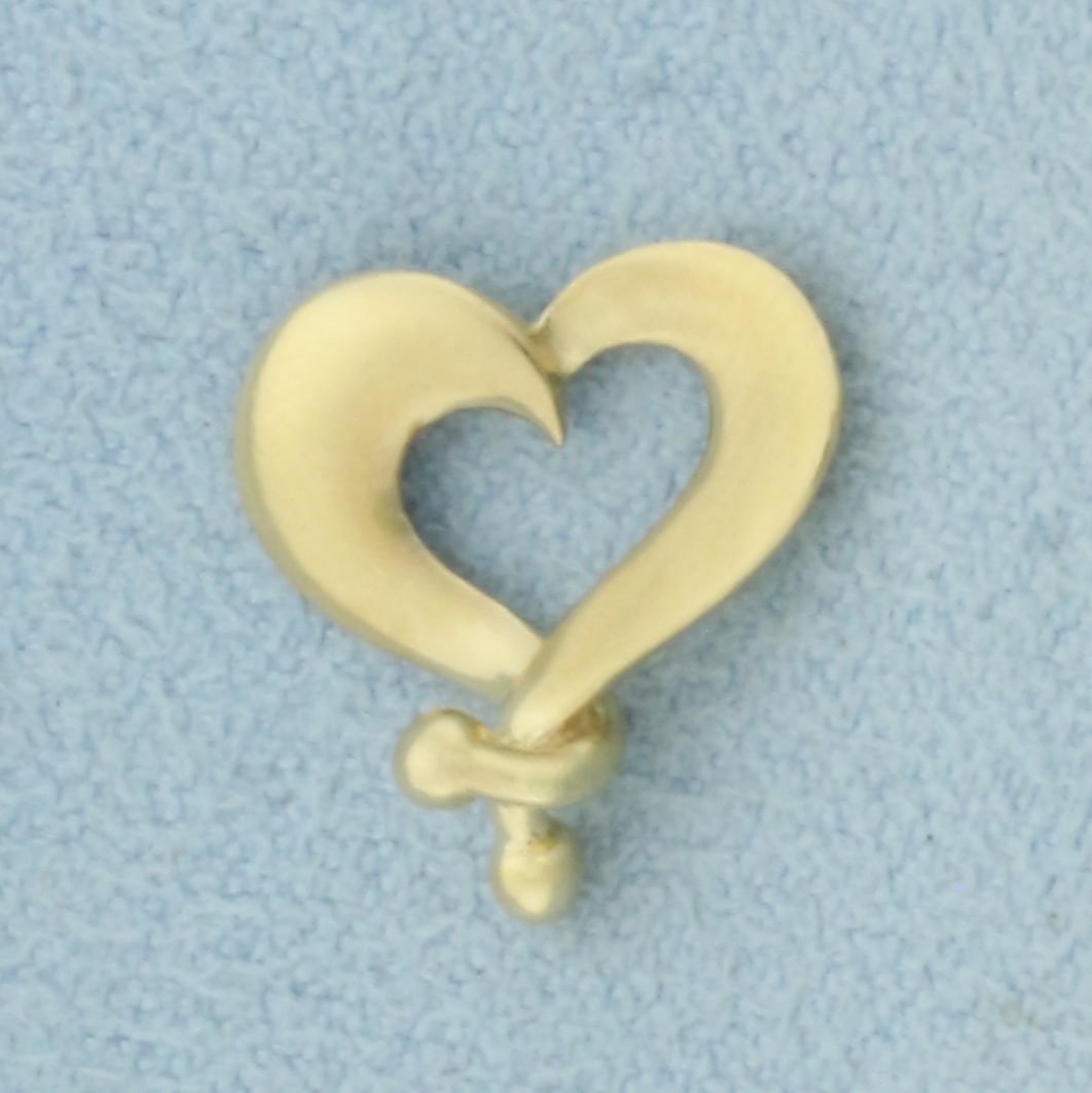 Unique Heart Slide Pendant or Charm in 14k Yellow Gold: In 14k Yellow Gold. 1/2 inch long and wide. 0.8g.