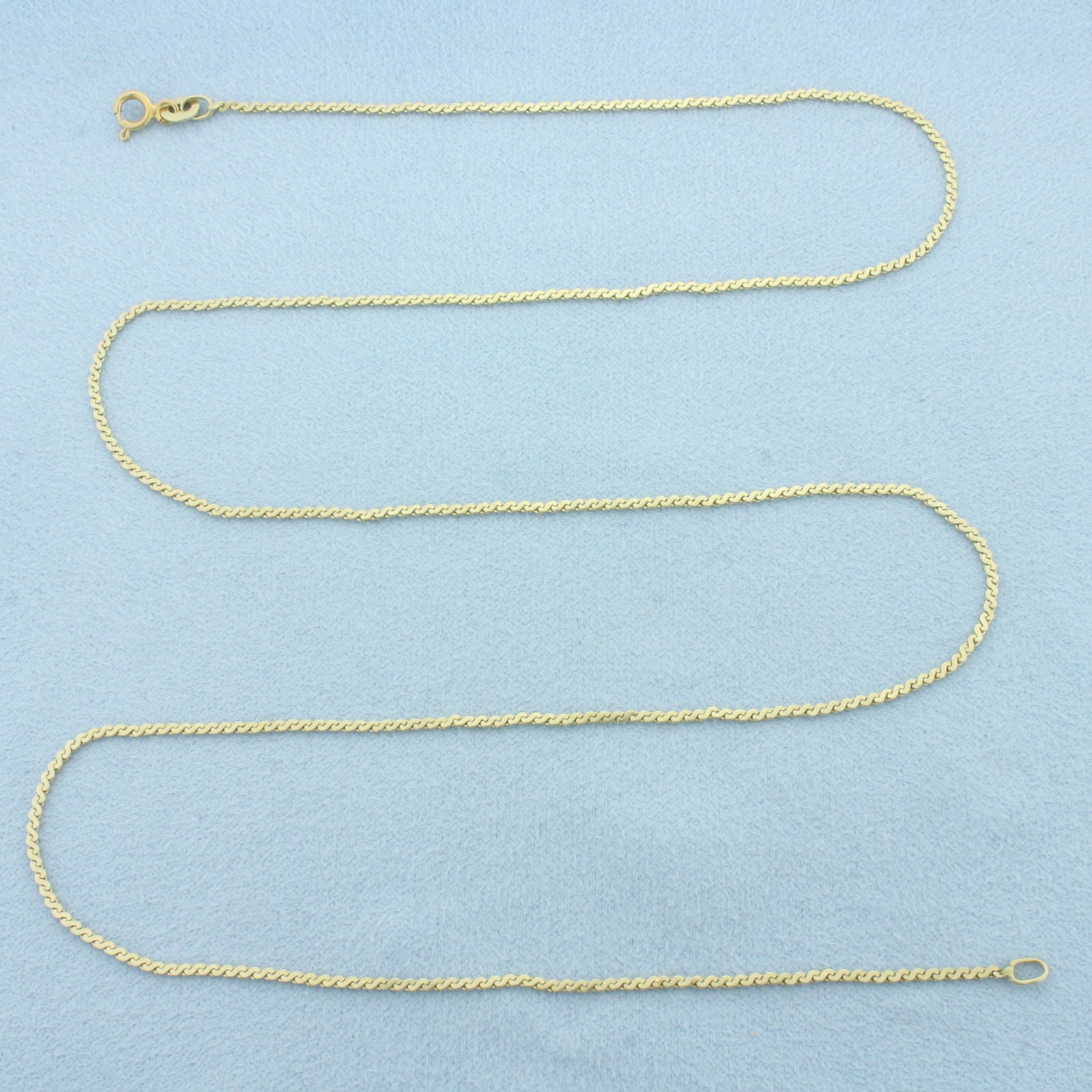 22 Inch Italian S-Link Link Chain Necklace in 14k Yellow Gold: In 14k Yellow Gold. 22 inches long. 1.3mm wide. Italian made. Spring clasp. 3.6g.