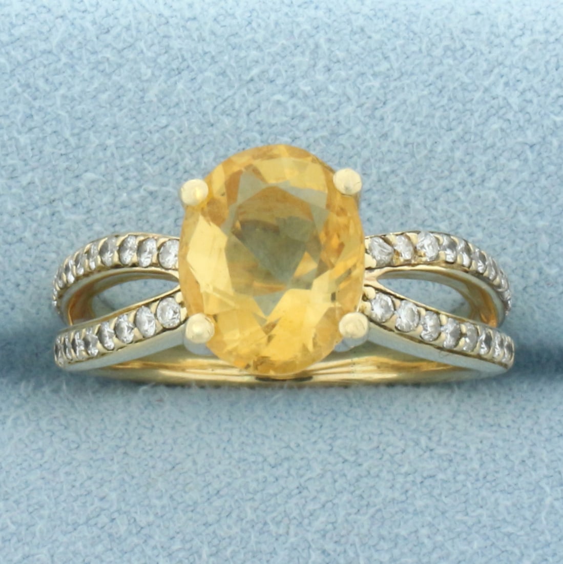 Citrine and Diamond Split Shank Ring in 14k Yellow Gold: In 14k Yellow Gold. Contains one 11mm x 9 mm high quality natural 4ct oval cut Citrine gemstone with vibrant color and excellent clarity. Also contains forty high quality 1/2pt diamonds. Size 9.5. 7.7