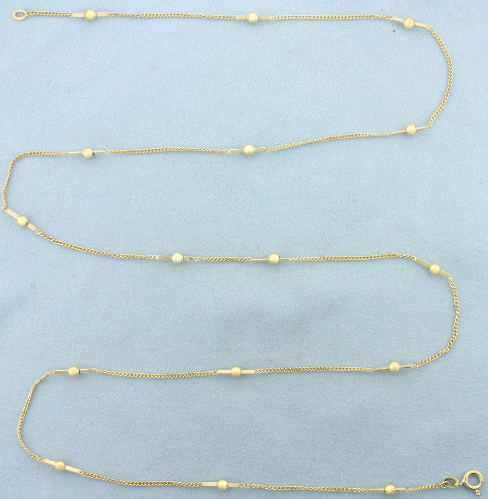 Italian 31 Inch Ball Bead and Bar Chain Necklace in 14k Yellow Gold: In 14k Yellow Gold. 31 inches long. 1.4mm wide chain. 3.75mm wide ball beads. Italian made. Spring clasp. 8.4g.