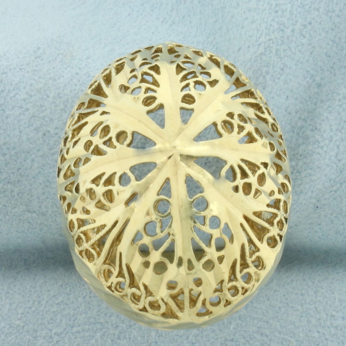 3D Large Bombe Statement Ring in 14k Yellow Gold: In 14k Yellow Gold. 1 1/8 inch long by 7/8 inch wide at top of ring. Size 9 1/4. 8.2g.