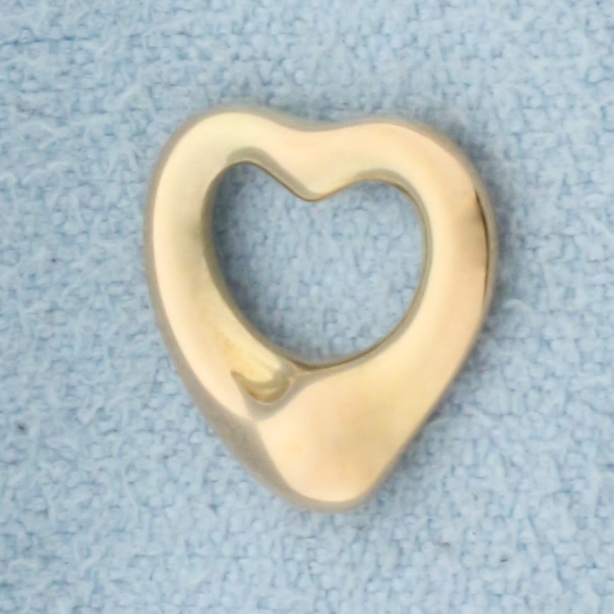 Tiffany and Co. Elsa Peretti Open Heart Pendant in 18k Rose Gold: In 18k Yellow Gold. Guaranteed Authentic Tiffany. 14x12mm wide pendant. Signed. 1.0g.