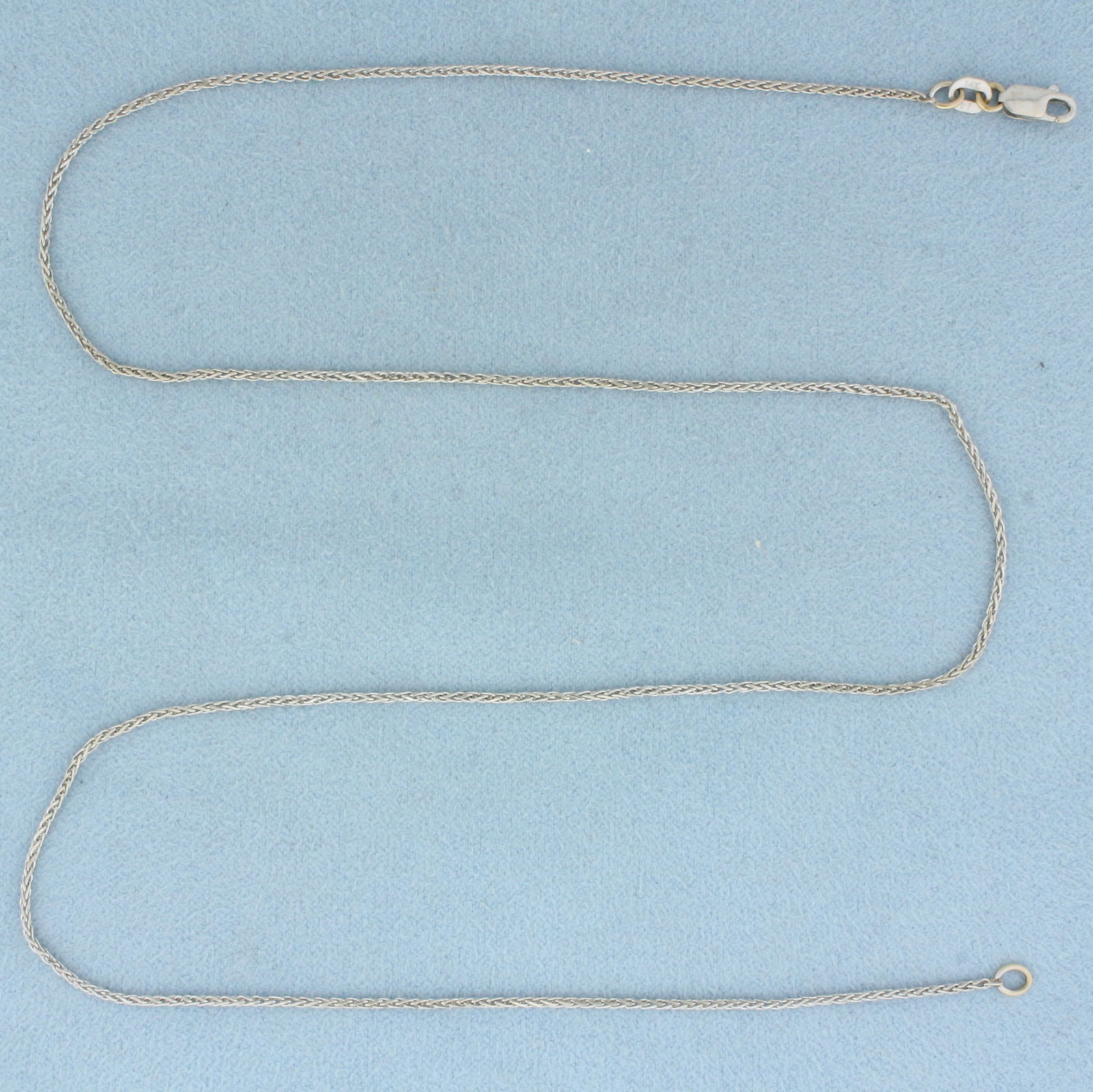 Italian 18 Inch Wheat Link Chain Necklace in 14k White Gold: In 14k White Gold. 18 inches long. 1mm wide. Wheat link. Made in Italy. Lobster clasp. 2.8g.