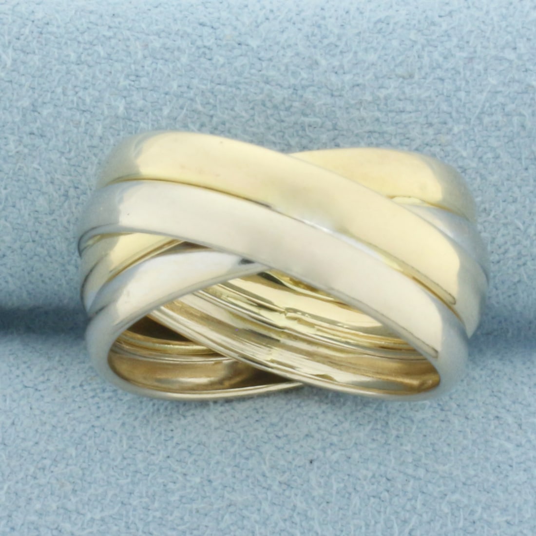 Italian Two Tone Four Band Twist Ring in 14k Yellow and White Gold: In 14k Yellow and White Gold. 11.7mm wide at widest. Italian made. Size 8. 4.1g.