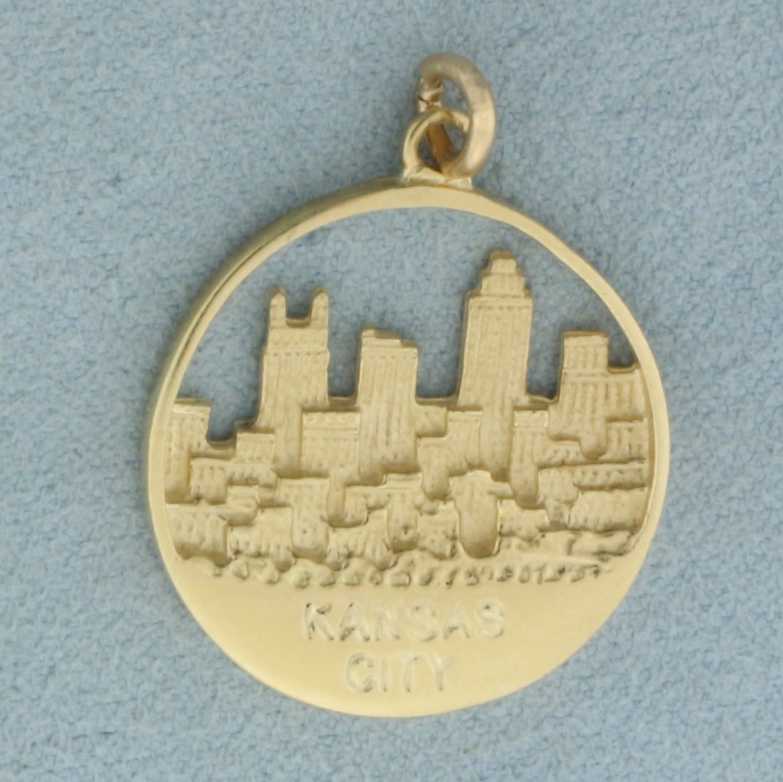 Vintage Kansas City Skyline Pendant in 14k Yellow Gold: In 14k Yellow Gold. 1 1/8 inch long (including jump ring). 7/8 inch wide. 5.2g.