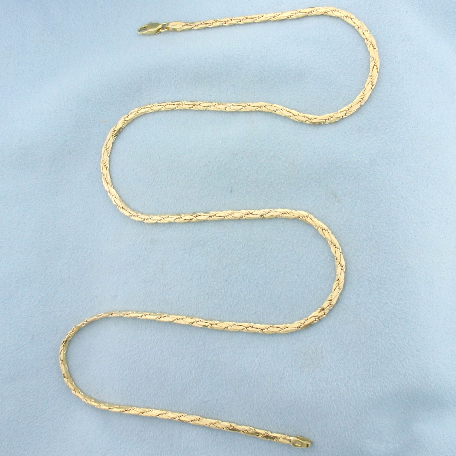 20 Inch Italian Flat Rope Link Chain Necklace in Solid 14k Yellow Gold: In 14k yellow gold. 20 inches long and 2.8mm wide. Lobster clasp. 16.0g.