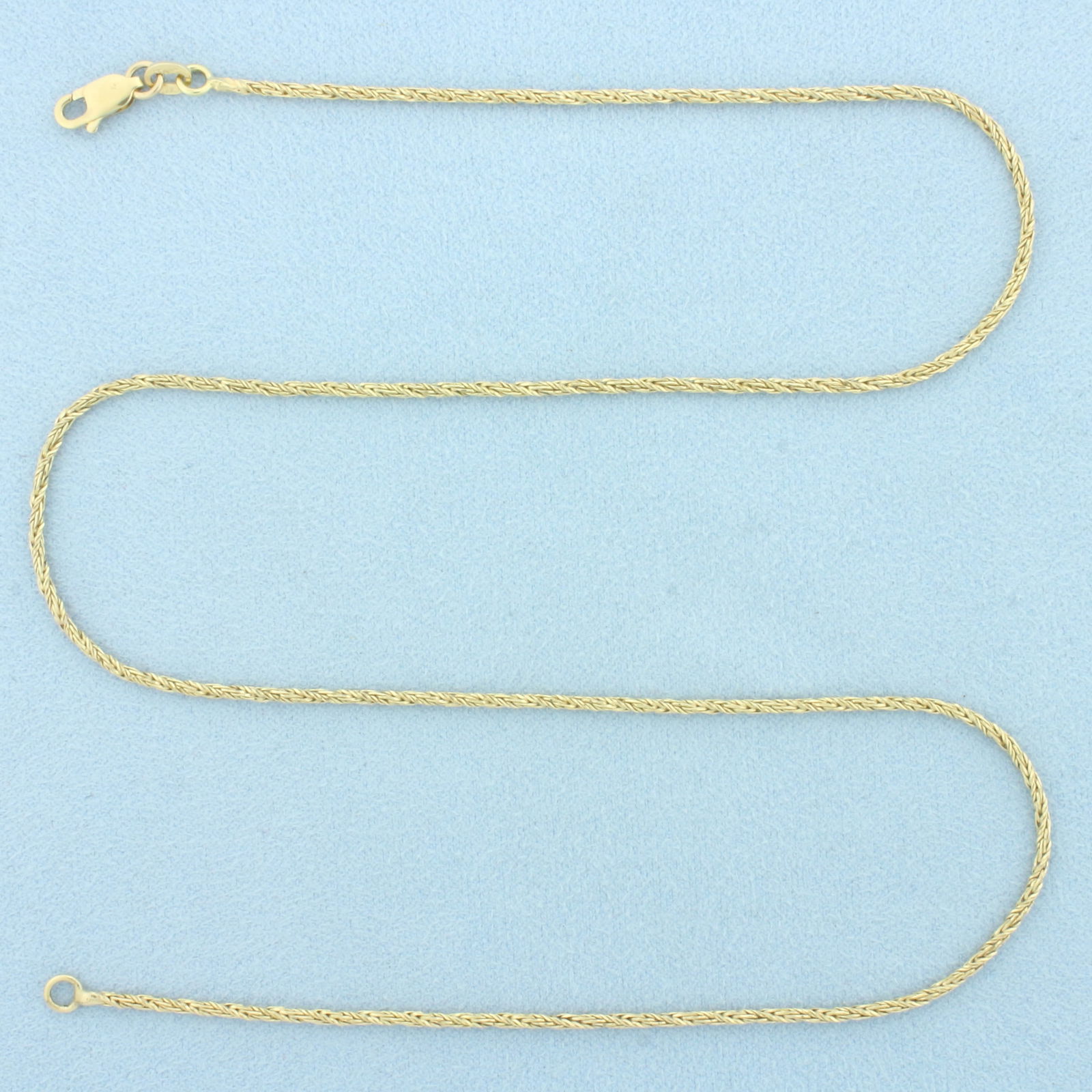 19 Inch Italian Wheat Link Chain Necklace in 14k Yellow Gold: In 14k Yellow Gold. 19 inches long. 1.6mm wide. Italian made. Lobster clasp. 5.7g.