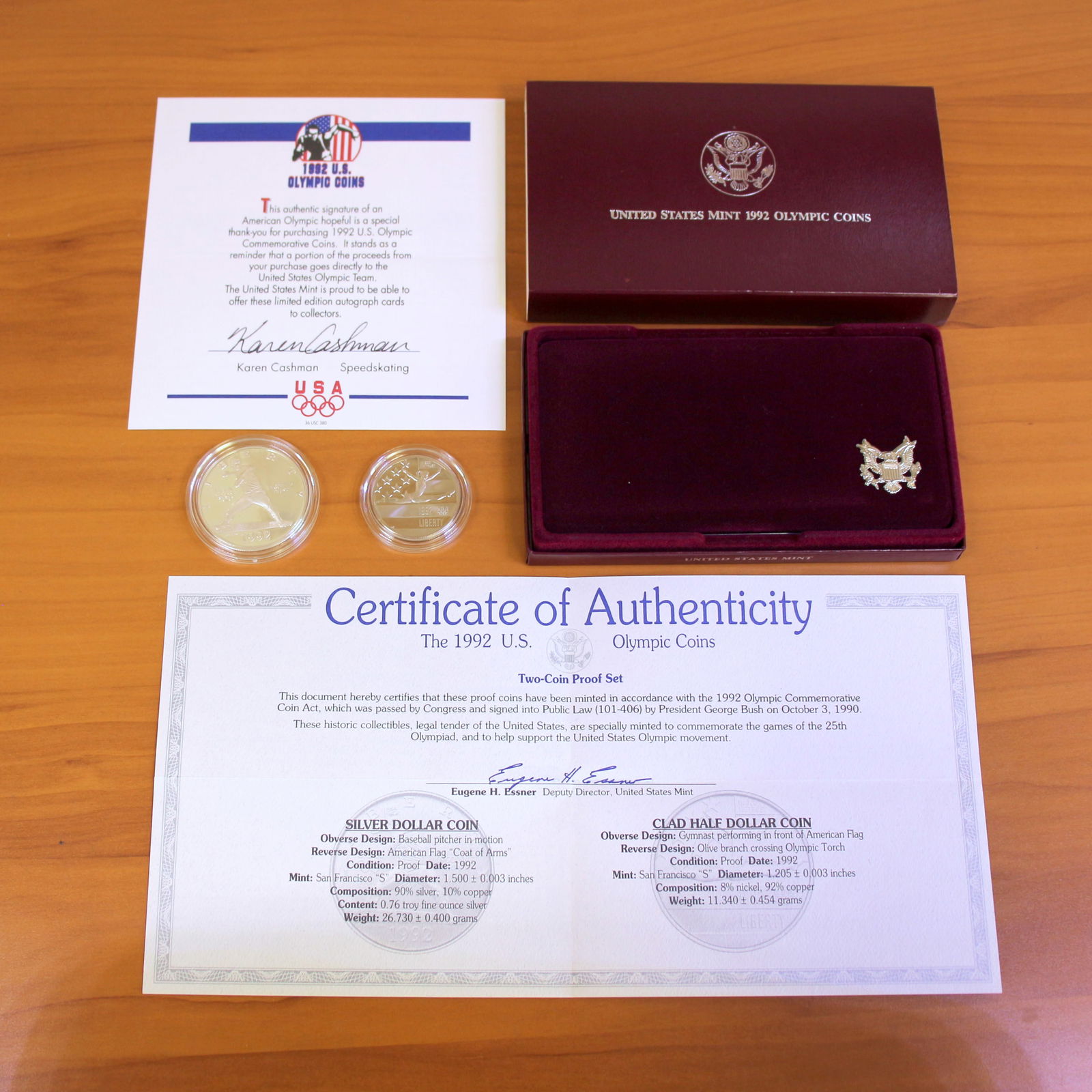 US Mint Olympic Silver Proof Coin Set OGP: Contains one 1992 United States Mint 90% Silver Commemorative Silver Dollar. Also contains one 1992 Clad Half Dollar. Set in original packaging and contains certificate of authenticity.