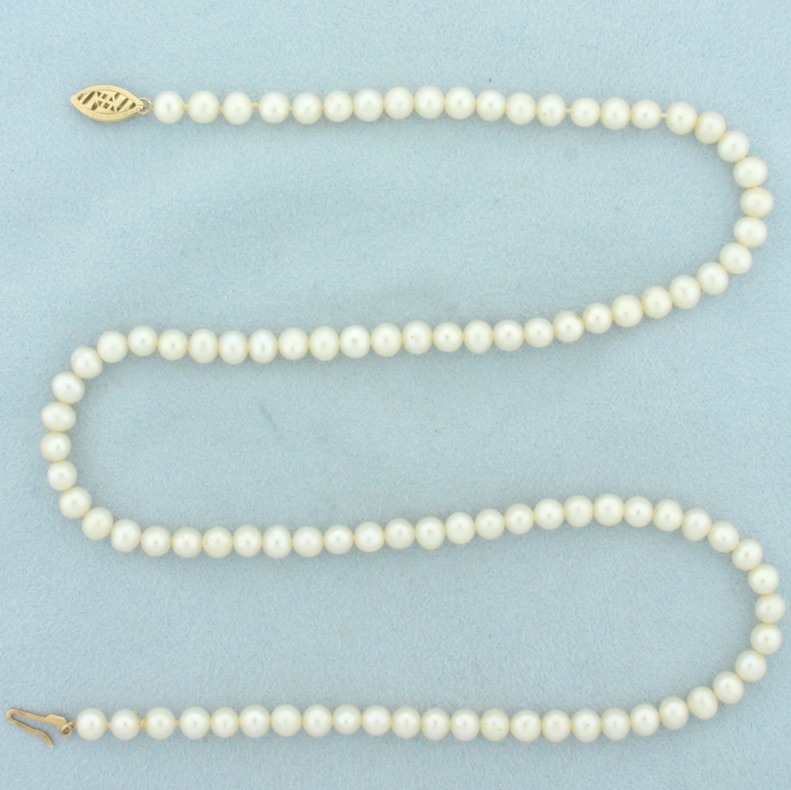 Cultured Pearl Strand Necklace with 14k Gold Clasp: 14k yellow gold clasp. Contains One hundred 5mm cultured pearls with high luster. 18 inches long. Fish Hook Clasp. 14.1g