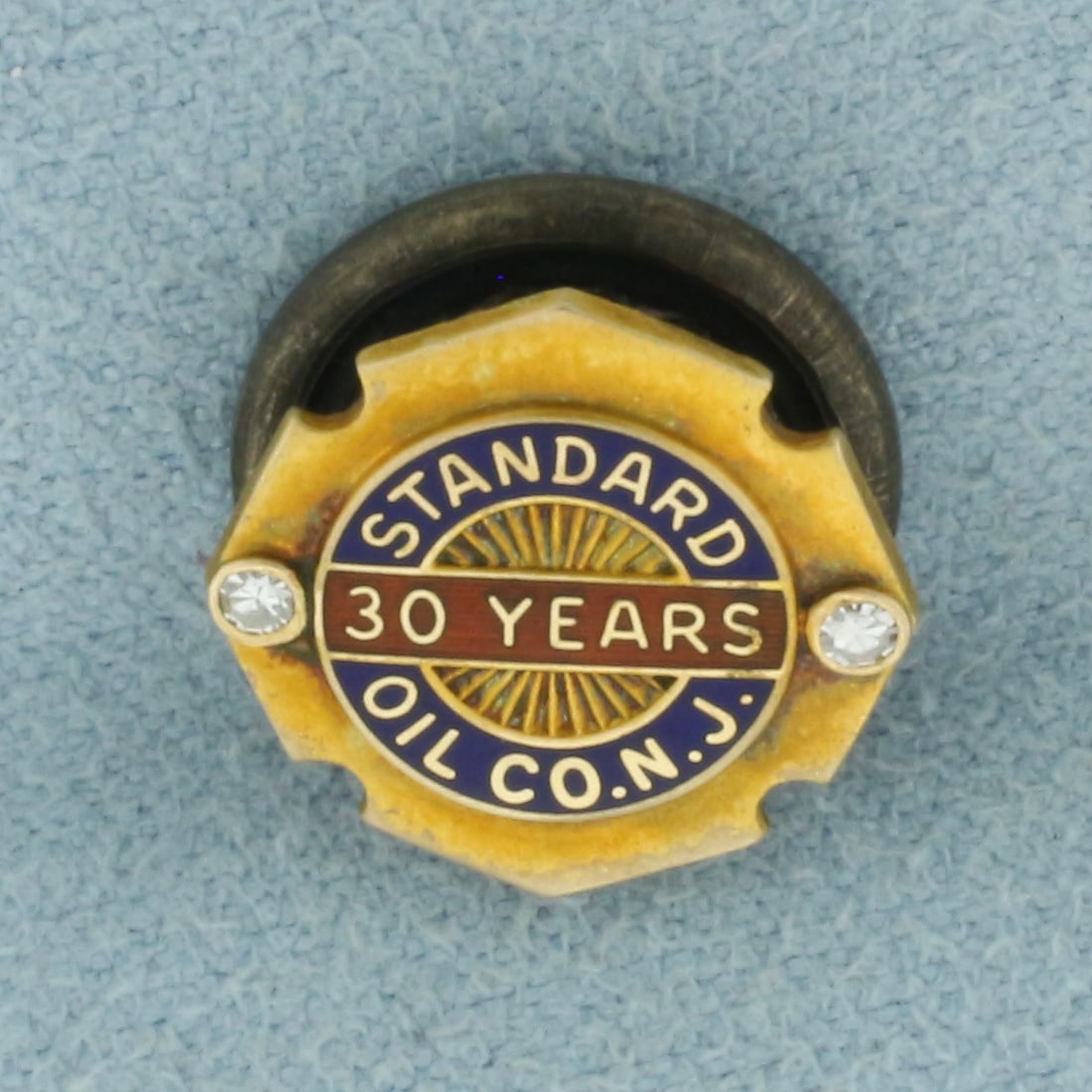Vintage Standard Oil 30 Years Diamond Pin in 14k Yellow Gold: 14k Yellow Gold Pin with .925 Sterling Silver Back. Contains two .02ct high quality diamonds, VS clarity/G color. 1/2 inch long. 1/2 inch wide. Enamel details. 2.7g.