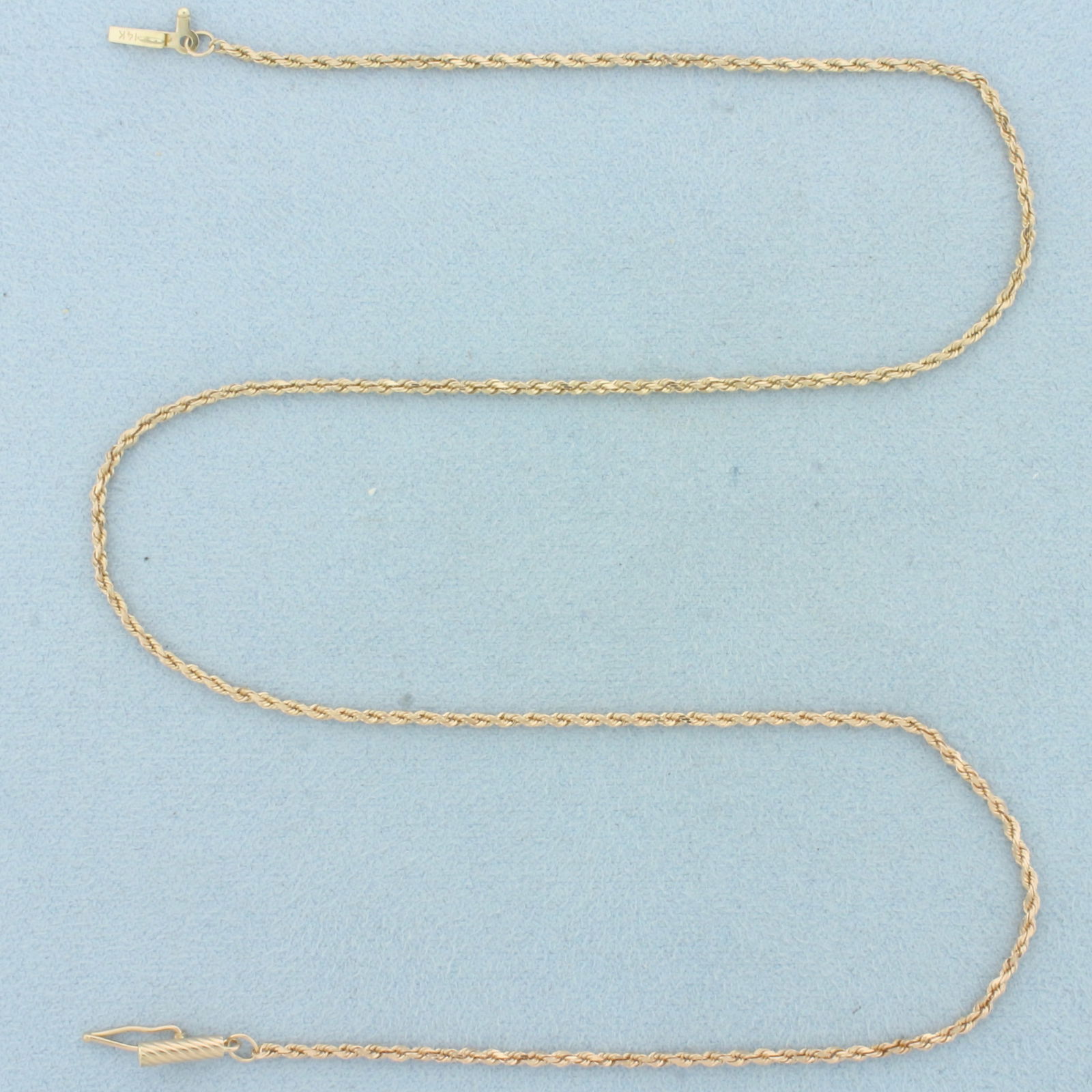 16 Inch Rope Link Chain Necklace in 14k Rose Gold: In 14k Rose Gold. 16 inches long. 1.7mm wide. Rope link. Slide clasp with safety latch. 3.7g.