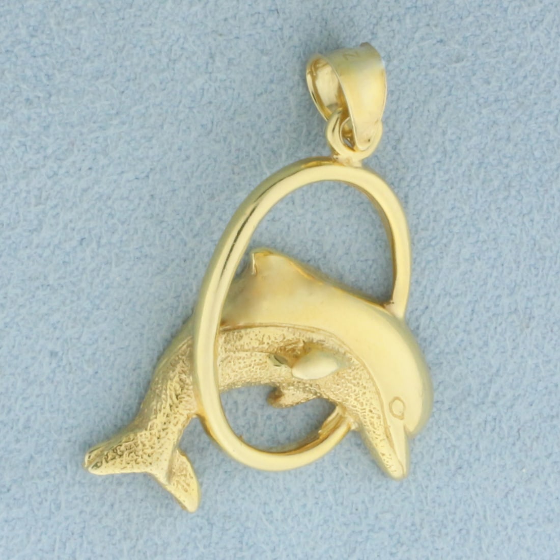 Dolphin Hoop Pendant in 14k Yellow Gold: In 14k Yellow Gold. 1 1/4 inches long including bale. 7/8 inch wide. 4.3g.