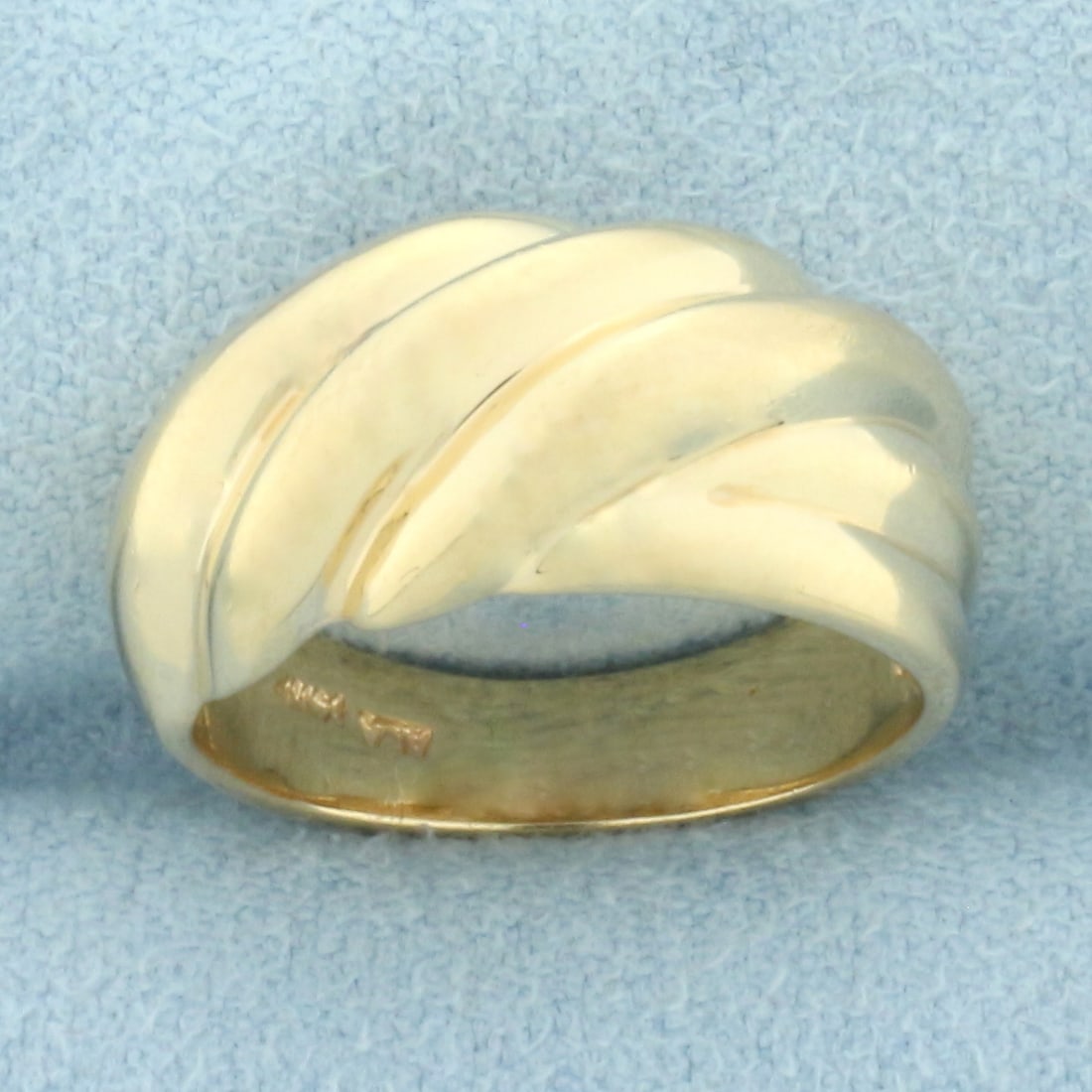 Smooth Cable Rope Ring in 14k Yellow Gold: In 14k yellow gold. 9.5mm wide at center. Size: 5.5. 6.3g.