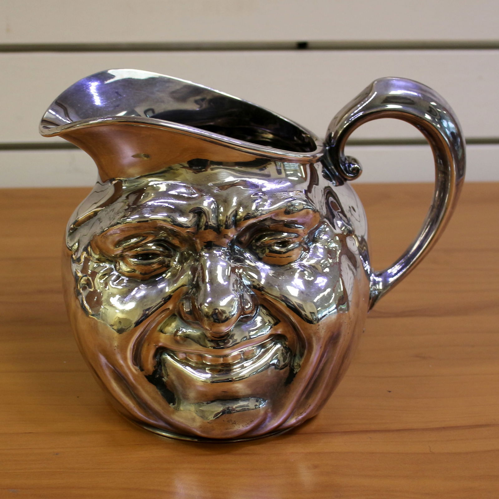 Reed & Barton Sunny Jim Double Face 5640 Water Pitcher: Silver plate. Six inches tall. Excellent condition.