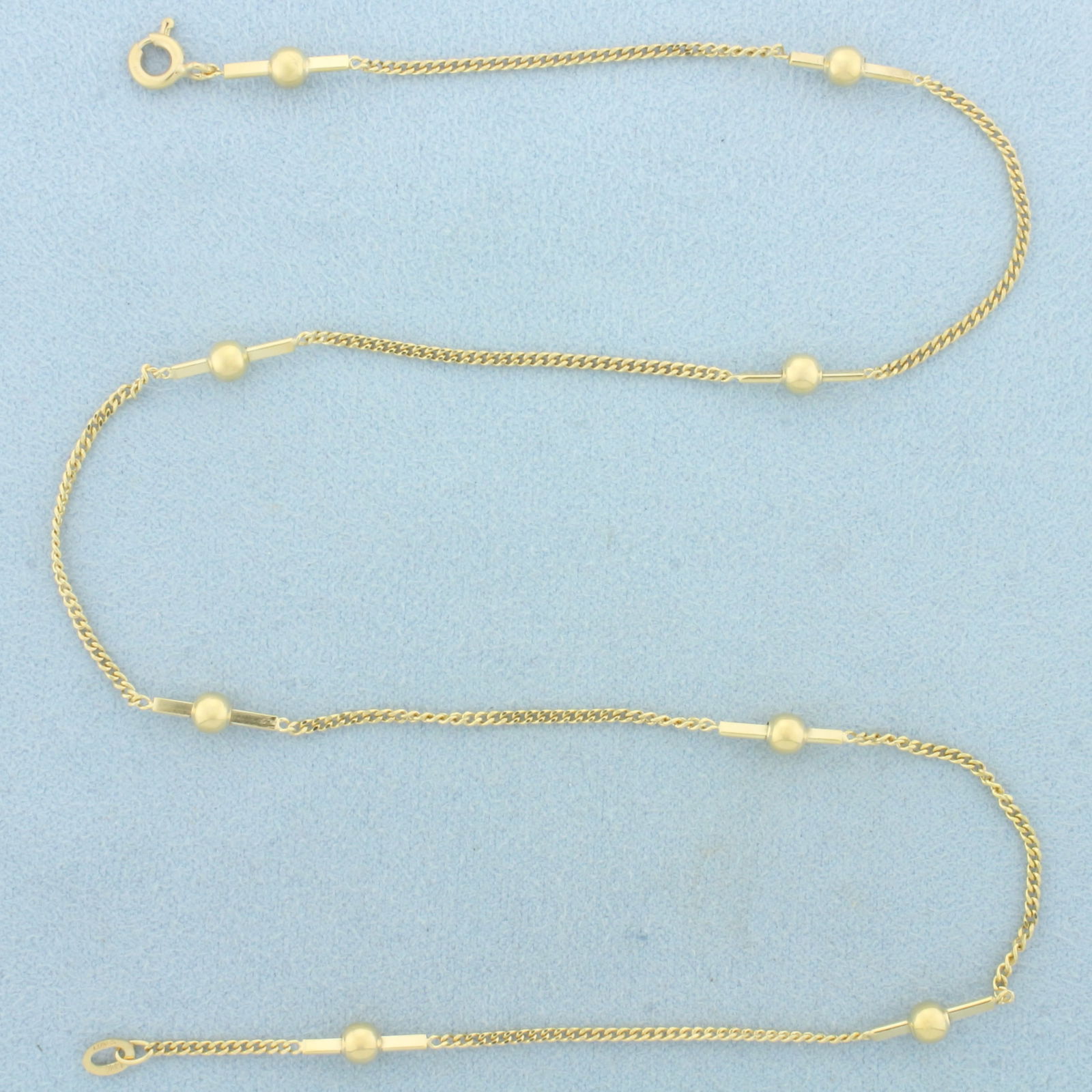 Ball Bead Curb Link Station Choker Necklace in 14k Yellow Gold: In 14k Yellow Gold. 15 1/2 inches long. 1.5mm wide curb link chain. 3mm ball beads. 4.3g.