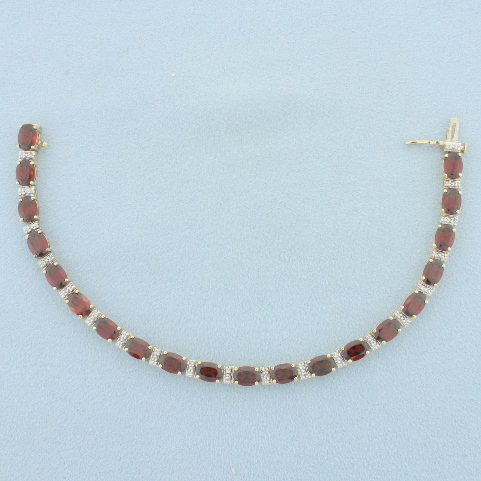Garnet and Diamond Tennis Bracelet in 14k Yellow Gold (1 of 2)