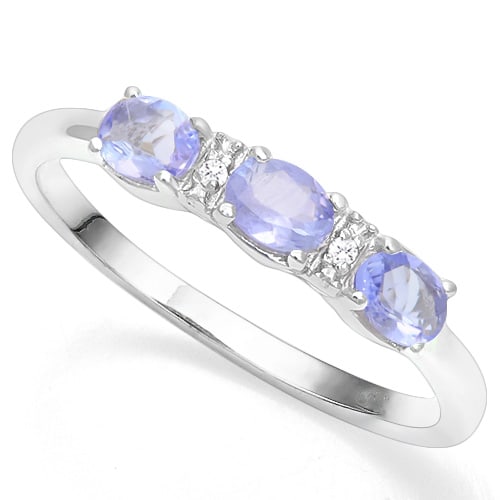 Tanzanite & Diamond Ring in Sterling Silver: In platinum over .925 sterling silver. Contains 3 tanzanite gemstones, 1/2ctw, accented with 2 genuine diamonds, .01ctw. Size 8. 1.1g
