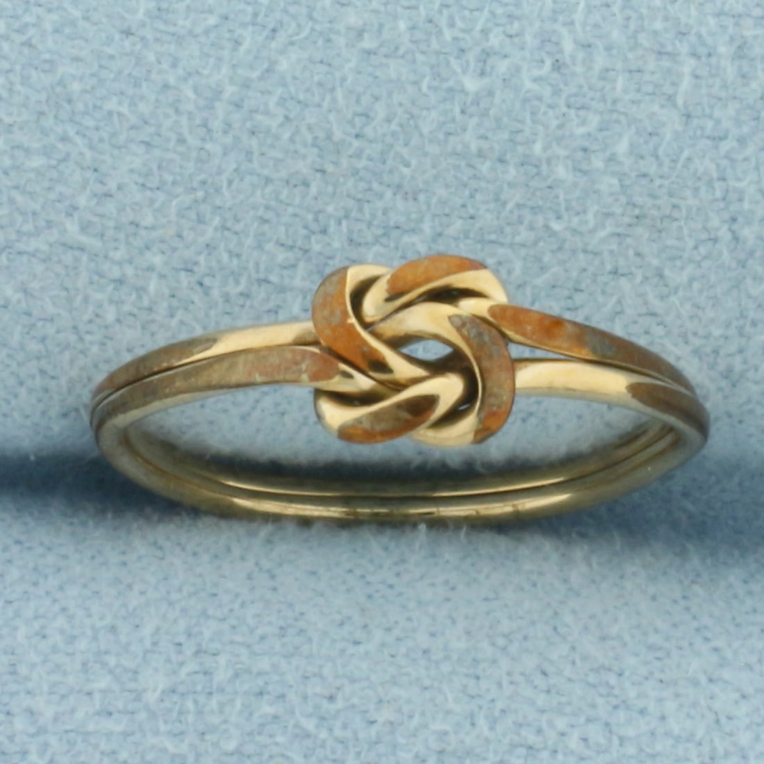 Vintage Two Ring Puzzle Knot Ring in Gold Plate: In Gold Plate. 5.7mm wide at center. Size 6. 1.2g.