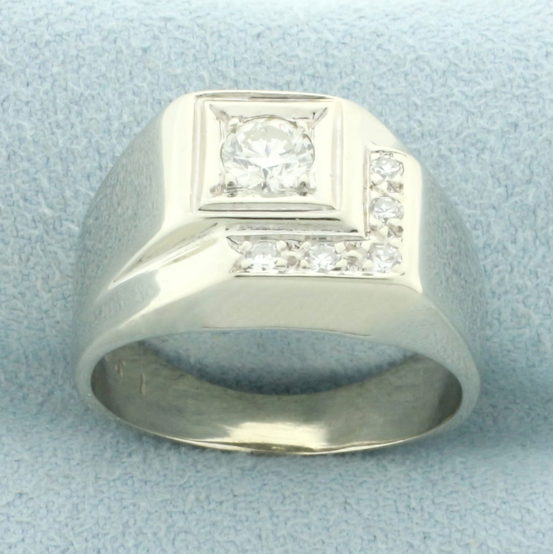 Diamond Geometric Design Ring in 14k White Gold: In 14k white gold. Contains one high quality round brilliant diamond, 1/4ct, VS clarity/G color. Also contains 5 single cut diamonds, .08ct TW, of similar high quality. Size: 6.75. 5.7g.