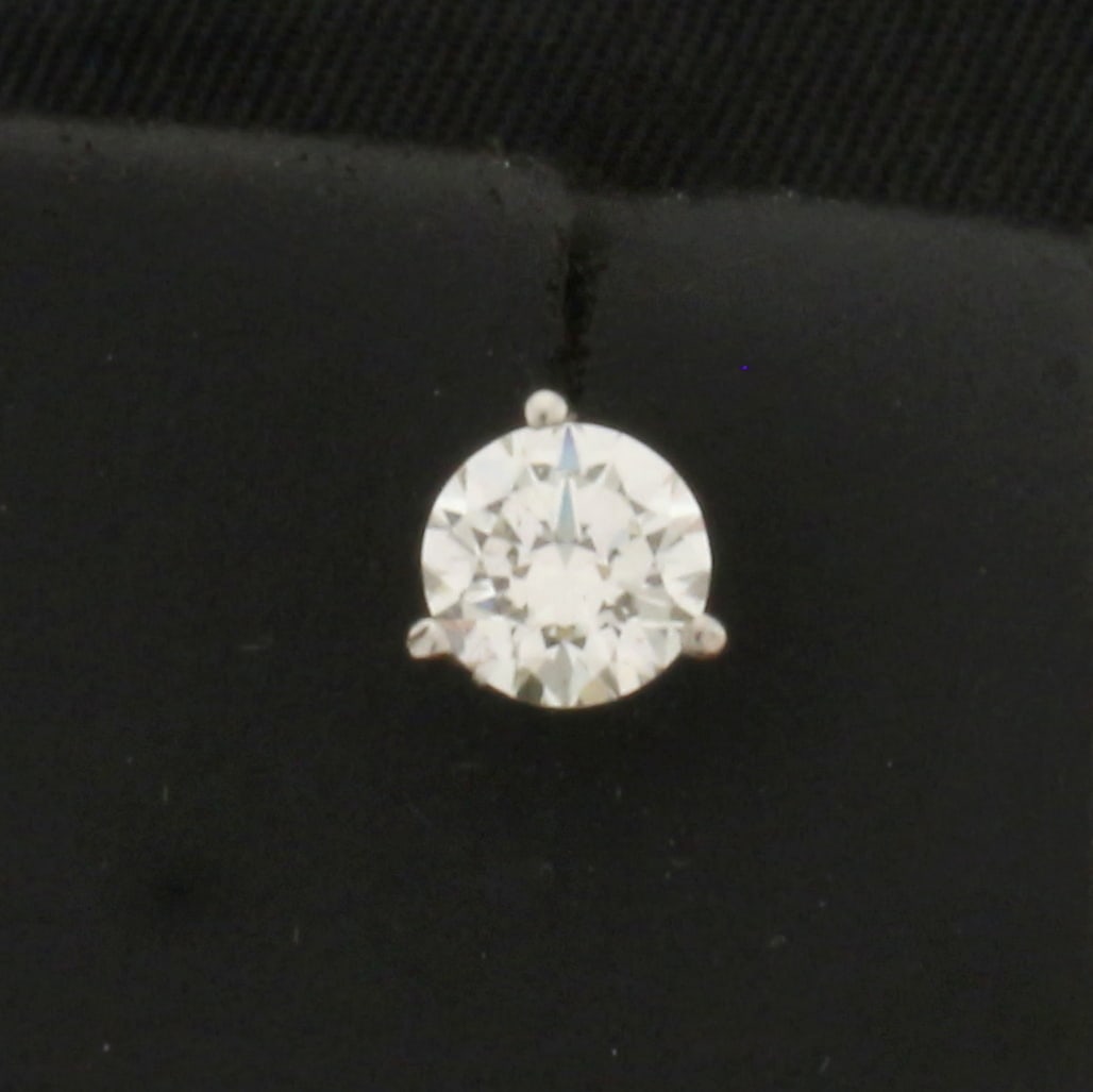 GIA Certified 1/2ct Single Diamond Stud Earring in Platinum Martini Setting: In platinum martini settings. Contains one high quality 1/2ct GIA certified round brilliant diamond, J color/SI 2 clarity, triple excellent cut for added brilliance, eye clean, no fluorescence.