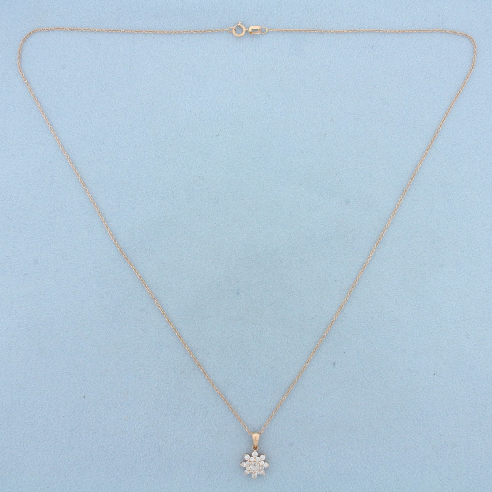 Crown of Light Crown Sun Necklace in 14k Rose Gold: In 14k Rose Gold. Contains one 3.5mm high quality Crown of Light diamond, H color/I1 clarity. Also contains eight .02ct and eight .01ct high quality diamonds of similar high quality. Pendant is 5/8