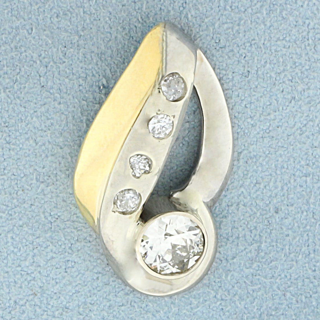 Vintage Old European Cut Diamond Pendant or Slide in 14K Yellow Gold: In 14K Yellow Gold. Contains one high quality 1.2ct Old European cut Diamond, VS1 clarity/J color. Also contains four high quality .05ct Old European cut Diamonds, VS to SI clarity/I to J color. 1 1/4