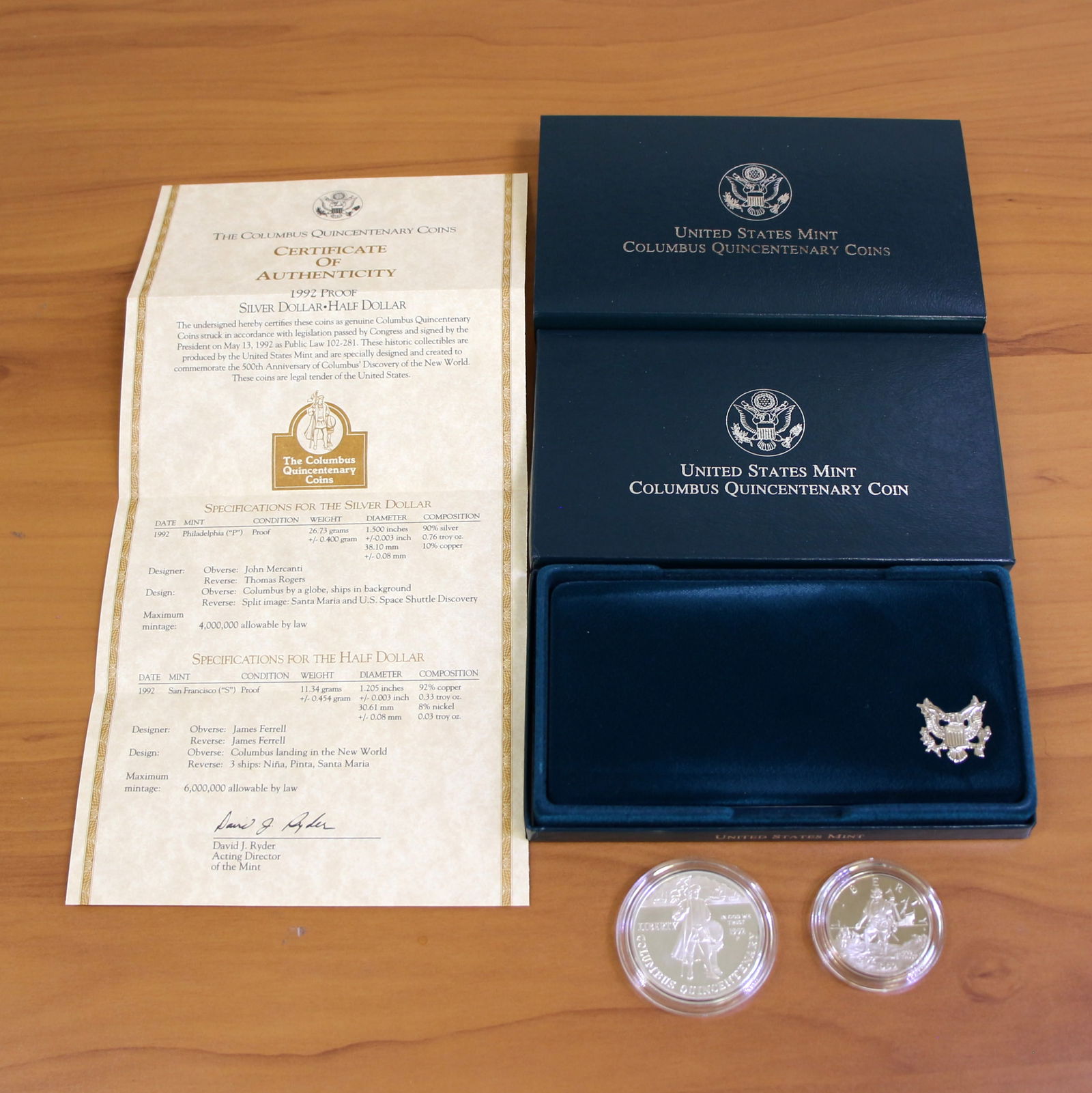 US Mint Columbus Quincentenary Uncirculated Coin Set OGP: Contains one 1992 90% Silver Columbus Quincentenary Silver Commemorative Dollar Proof. Also contains one 1992 Columbus Quincentenary Half Dollar Proof. Set in original government packaging and contain