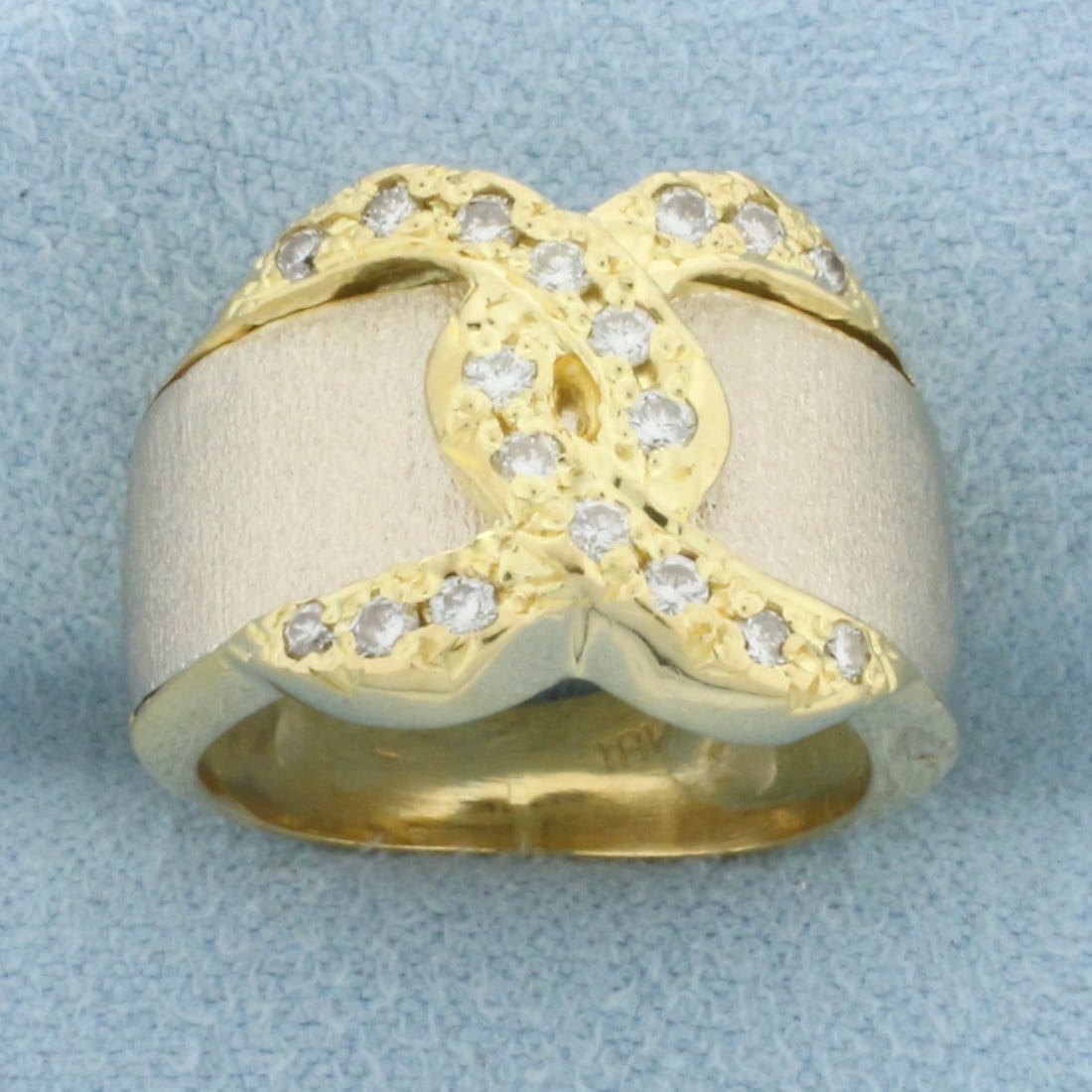 Diamond Pave Buckle Ring in 18k Yellow and White Gold: In 18k Yellow and White Gold. Contains eighteen .01ct diamonds, VS clarity/F color. 13.6mm wide at widest. Size 4.5. 9.7g.