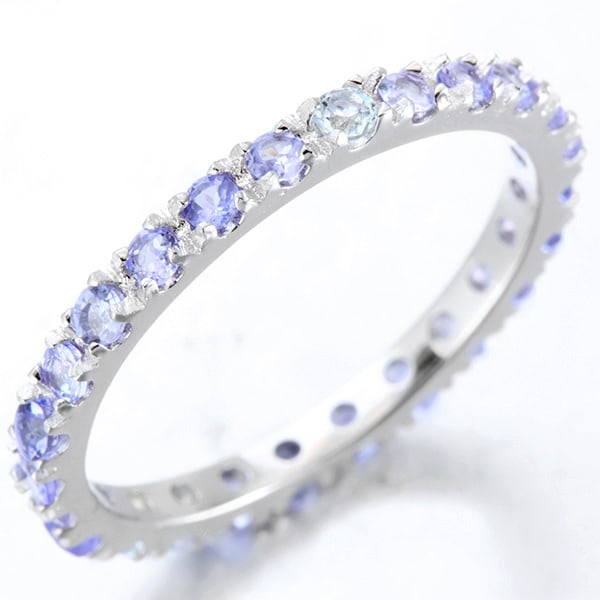Tanzanite Eternity Stacking Band Ring in Sterling Silver: In platinum over .925 sterling silver. Contains 30 genuine tanzanite gemstones with light purple/blue color, 1.0ctw. Size 7. 1.7g