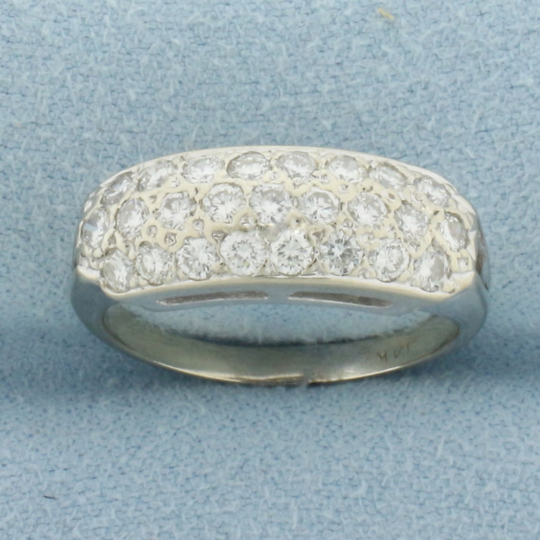 Pave Diamond Ring in 14k White Gold: In 14k White Gold. Contains twenty-five high quality diamonds, 1/2ct TW, VS clarity/G color. 6.7mm wide. Size 6.5. 3.4g.