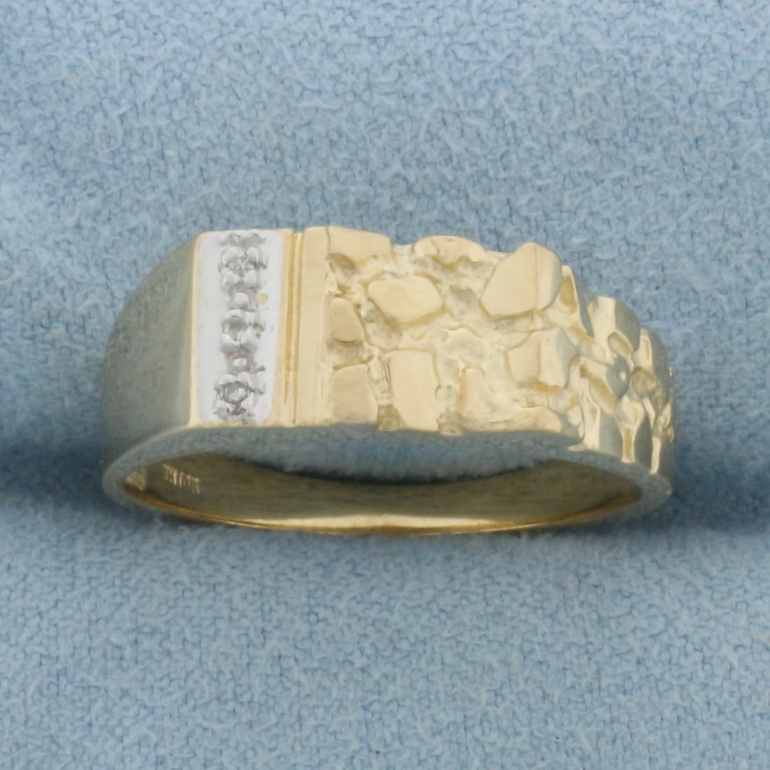 Diamond Gold Nugget Ring in 10k Yellow Gold: In 10k Yellow Gold. Contains three high quality 1/2pt diamonds. 7.4m wide at widest point. Size 9.5. 3.8g.