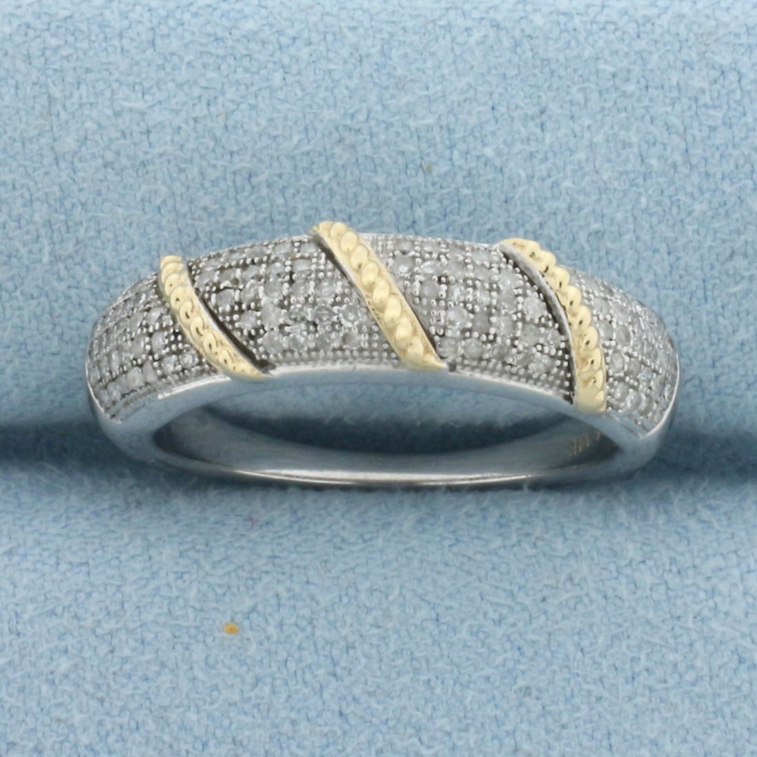 Pave Diamond Ring in 14k Yellow Gold and Sterling Silver: In 14k Yellow Gold and .925 Sterling Silver. Contains one hundred and four high quality diamonds, 1/2ct TW. 5.7mm wide. Size 8.25. 4.0g.