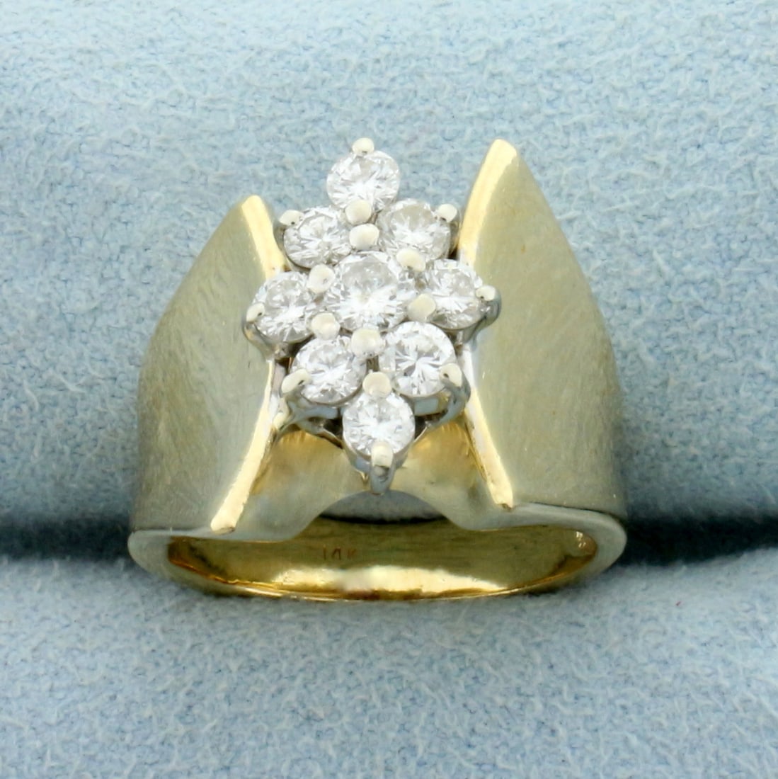 Modern Design Diamond Cluster Ring in 14K Yellow Gold: In 14K Yellow Gold. Contains one .1ct and eight .07ct high quality Diamonds, 2/3ct TW, SI clarity/H color. Size 3 3/4. 9.3g