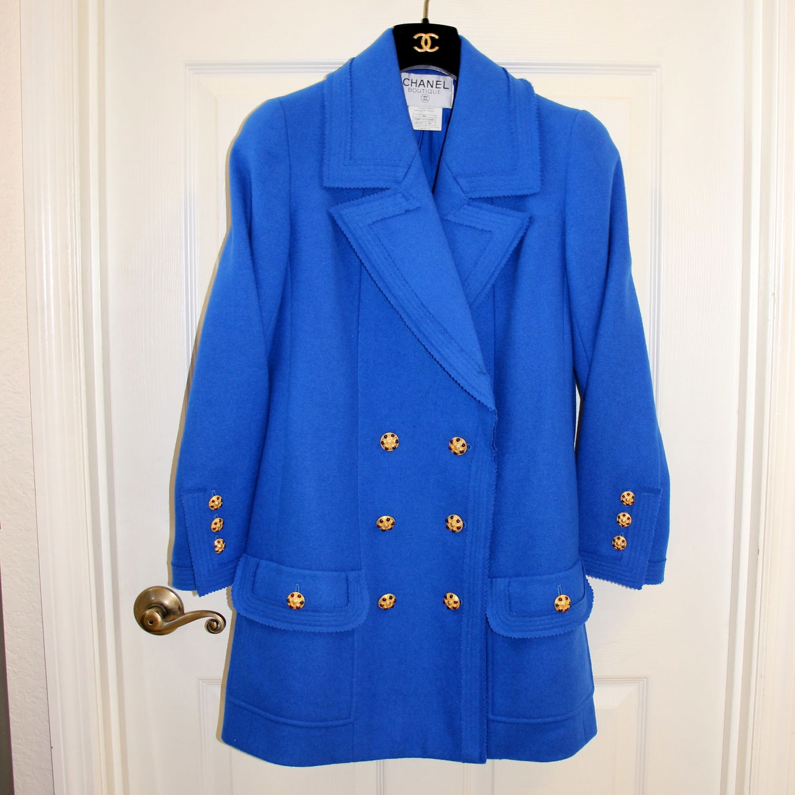 Chanel Cobalt Blue Gripoix Button Wool Melton 96A Outerwear Coat: Classic peacoat style. Number P08474V05085, AB169 from the coveted 96A season. Jacket is size 40. Composition is 100 percent wool outer with 100 percent silk lining. Fully lined with iconic Chanel int
