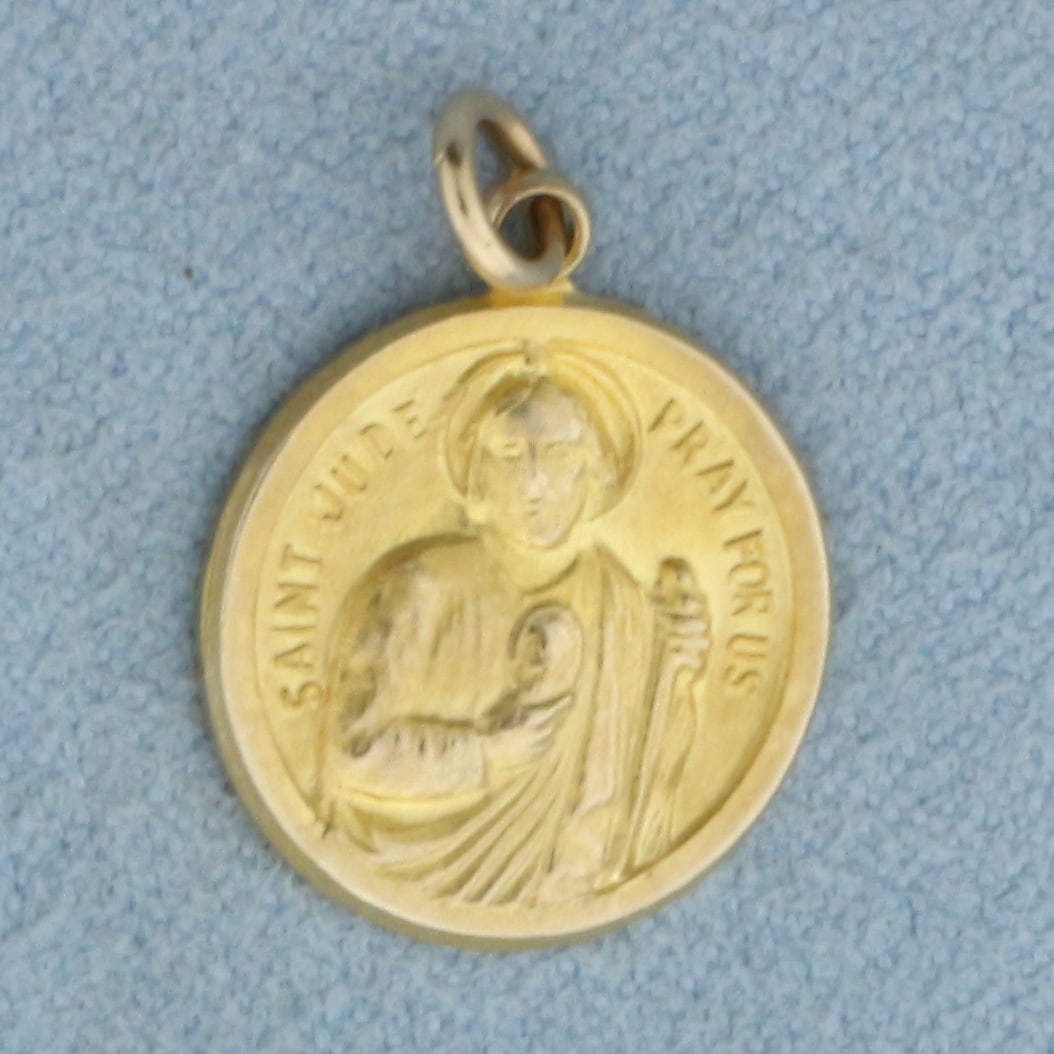 Saint Jude Pray For Us Charm in 10k Yellow Gold: In 10k Yellow Gold. 3/4 inch long. 1/2 inch wide. 1.8g.