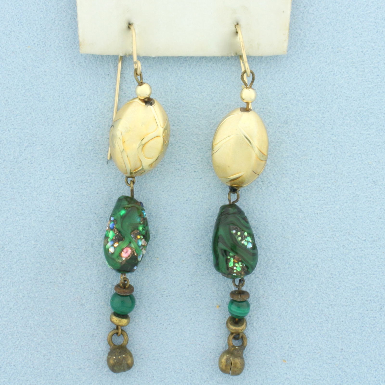 Art Glass Beaded Dangle Earrings in 14k Yellow Gold: In 14k Yellow Gold. 2 3/4 inch long. 3/8 inch wide. Hook backs. 7.3g.