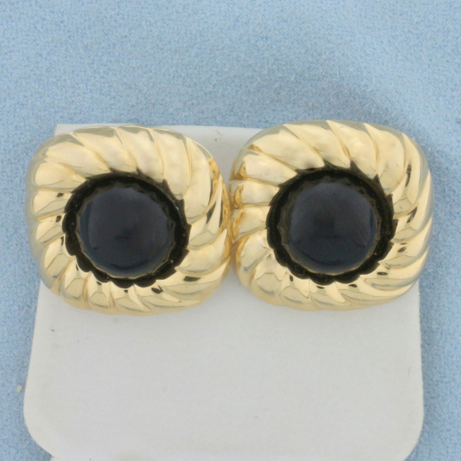 Vintage Onyx Button Earrings in 14K Yellow Gold: In 14K Yellow Gold. Each earring contains one high quality natural 12mm Onyx gemstone. 3/4 inch long and wide. Friction backs. 3.9g