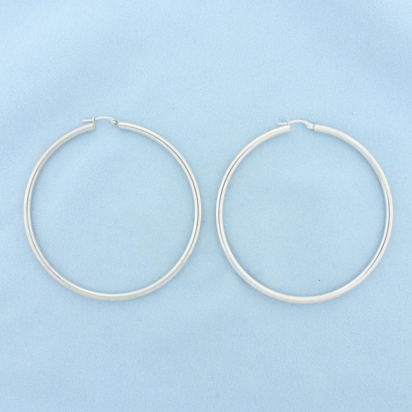 Large Hoop Earrings in 18k White Gold: In 18k white gold. 2 1/2 inch diameter. 3mm tubes. 6.2g.
