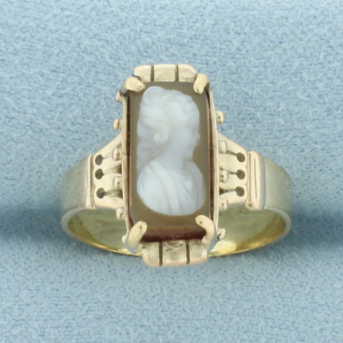 Vintage Carved Cameo Ring in 14k Yellow Gold: In 14k Yellow Gold. 12x6mm high quality hand carved Cameo. 16mm wide at top of ring. Size 6.5. 3.1g.