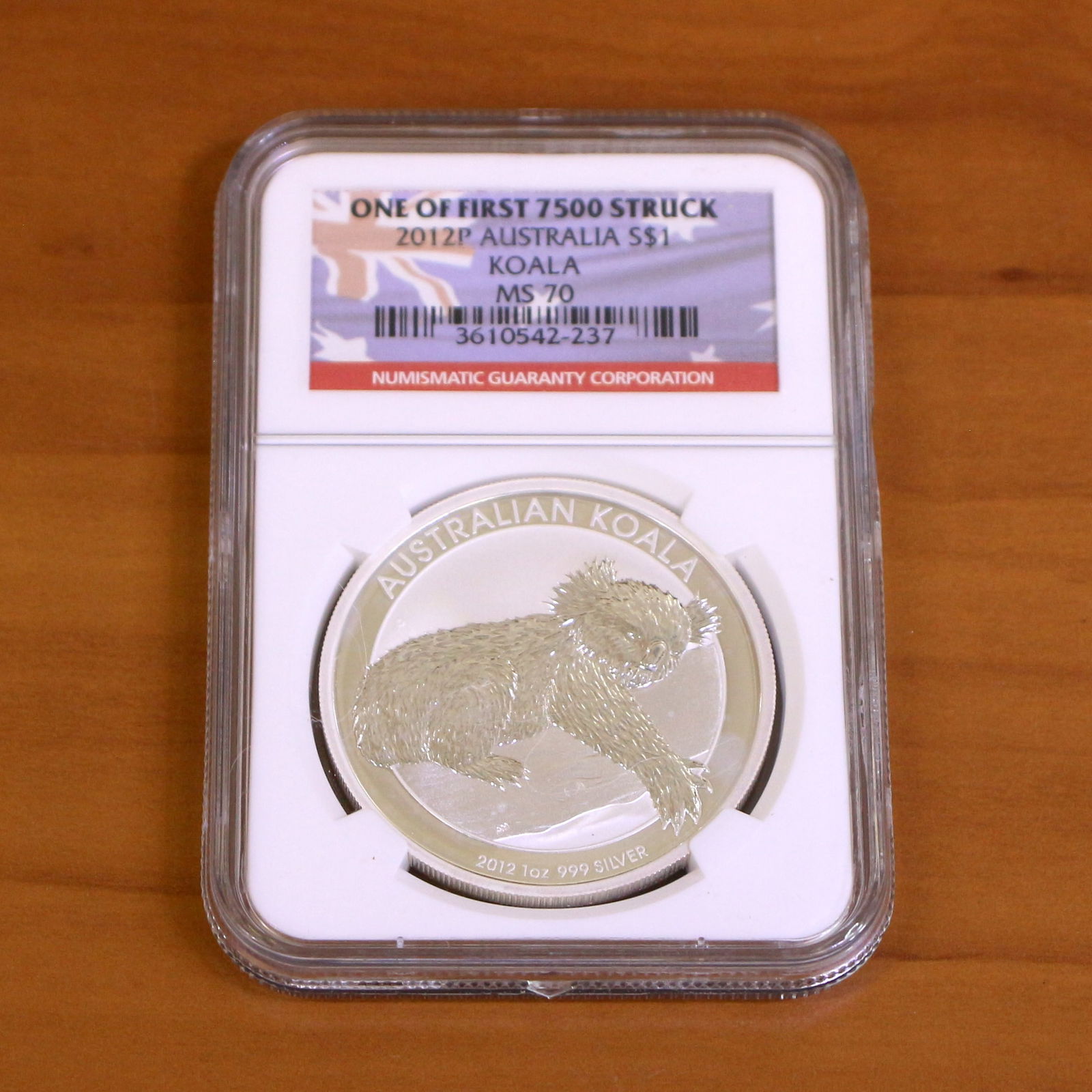 NGC 2012P MS70 Australia Koala $1 Silver Coin First Strike: Contains one 2012P MS70 Australia Koala Silver Dollar. First 7500 Struck. Packaged by NGC.