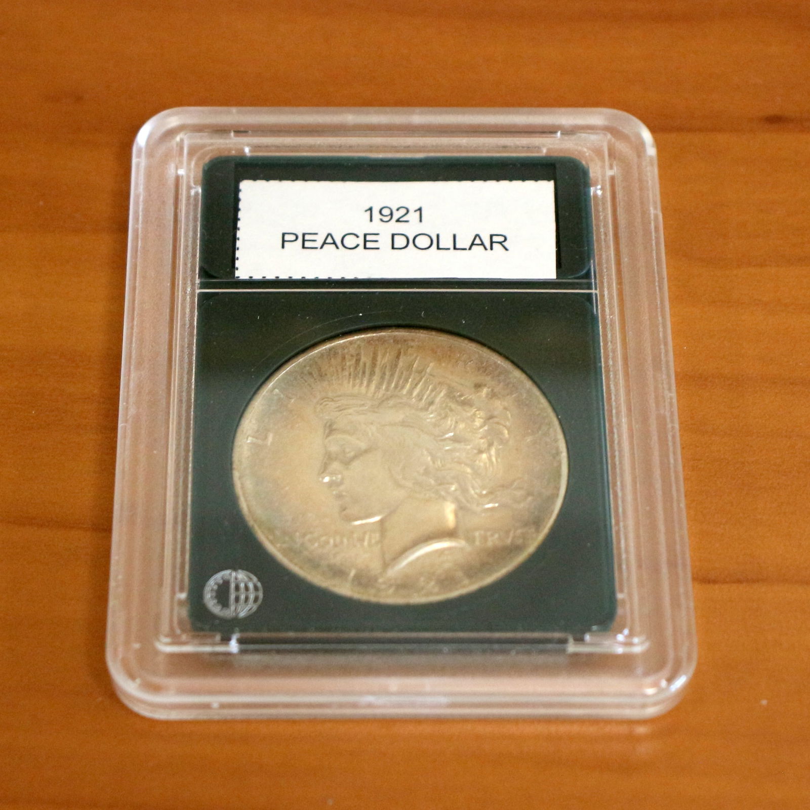 1921 Peace Silver Dollar In Slab (1 of 3)