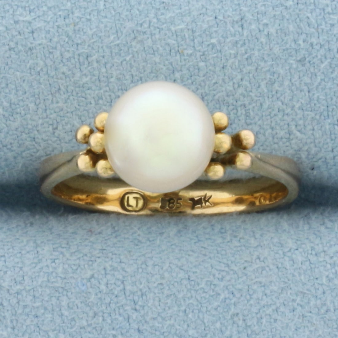 Cultured Akoya Pearl Ring in 14k Yellow Gold: In 14k Yellow Gold. Contains one 8mm high quality Cultured Akoya Pearl with beautiful pink undertone and high luster. Size 7.5. 3.6g.