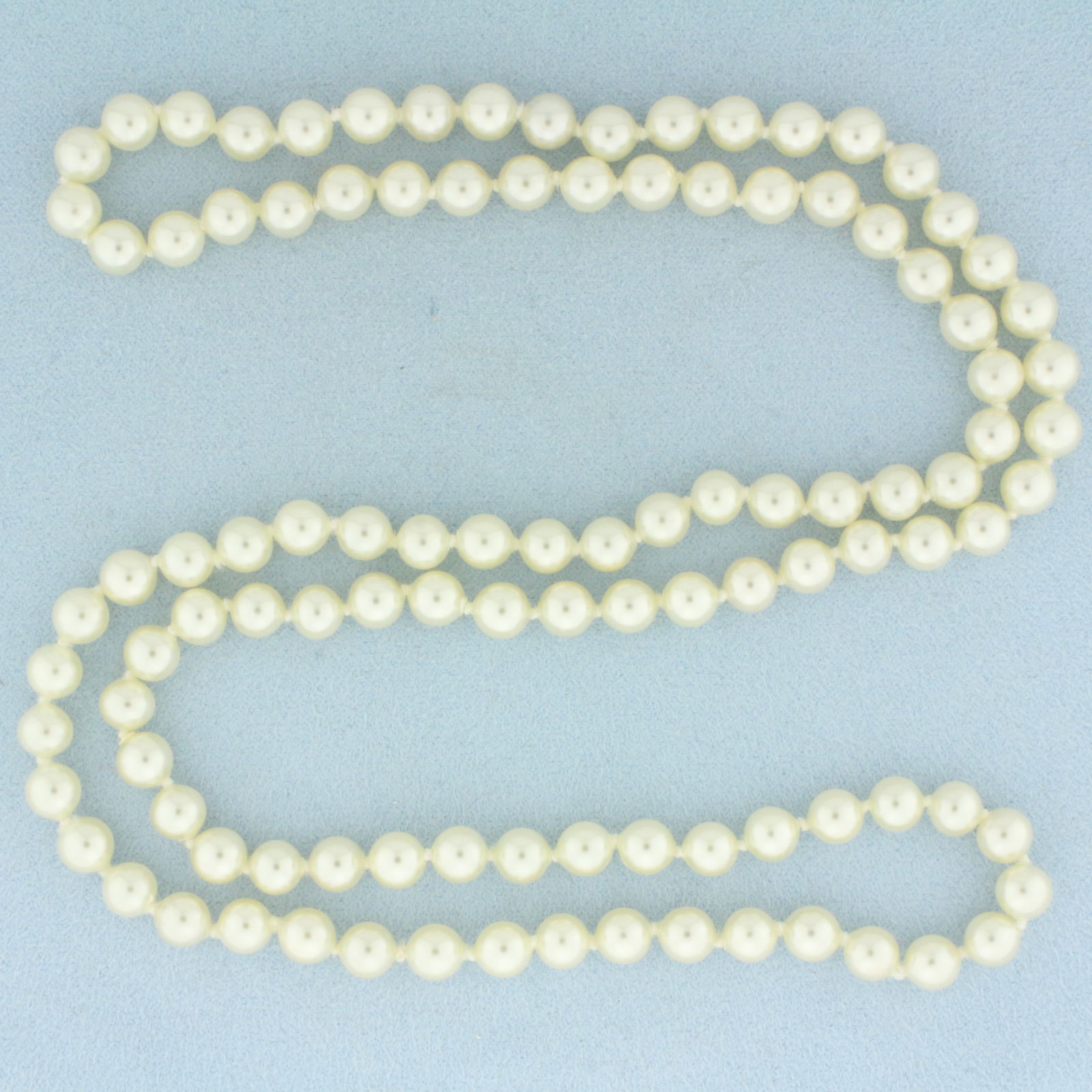 29 Inch Cultured Akoya Pearl Strand Necklace: Contains 6-6.2mm high quality cultured akoya pearls with high luster. 29 inches long. Hand knotted.