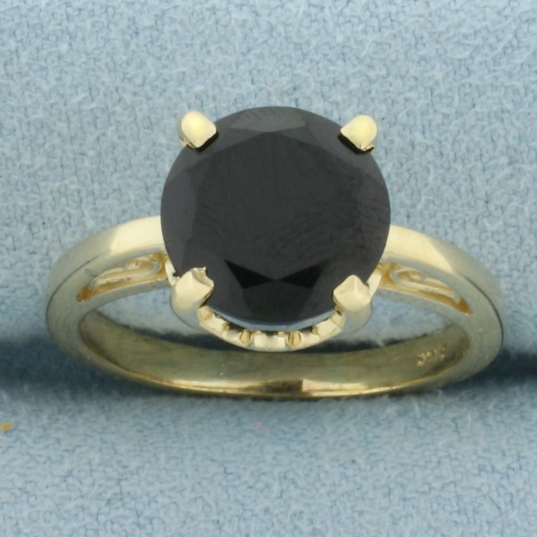 Black Tourmaline Solitaire Ring in 14k Yellow Gold: In 14k Yellow Gold. Contains one 10mm high quality natural Black Tourmaline gemstone, approximately 3.5cts. Size 8. 5.3g.